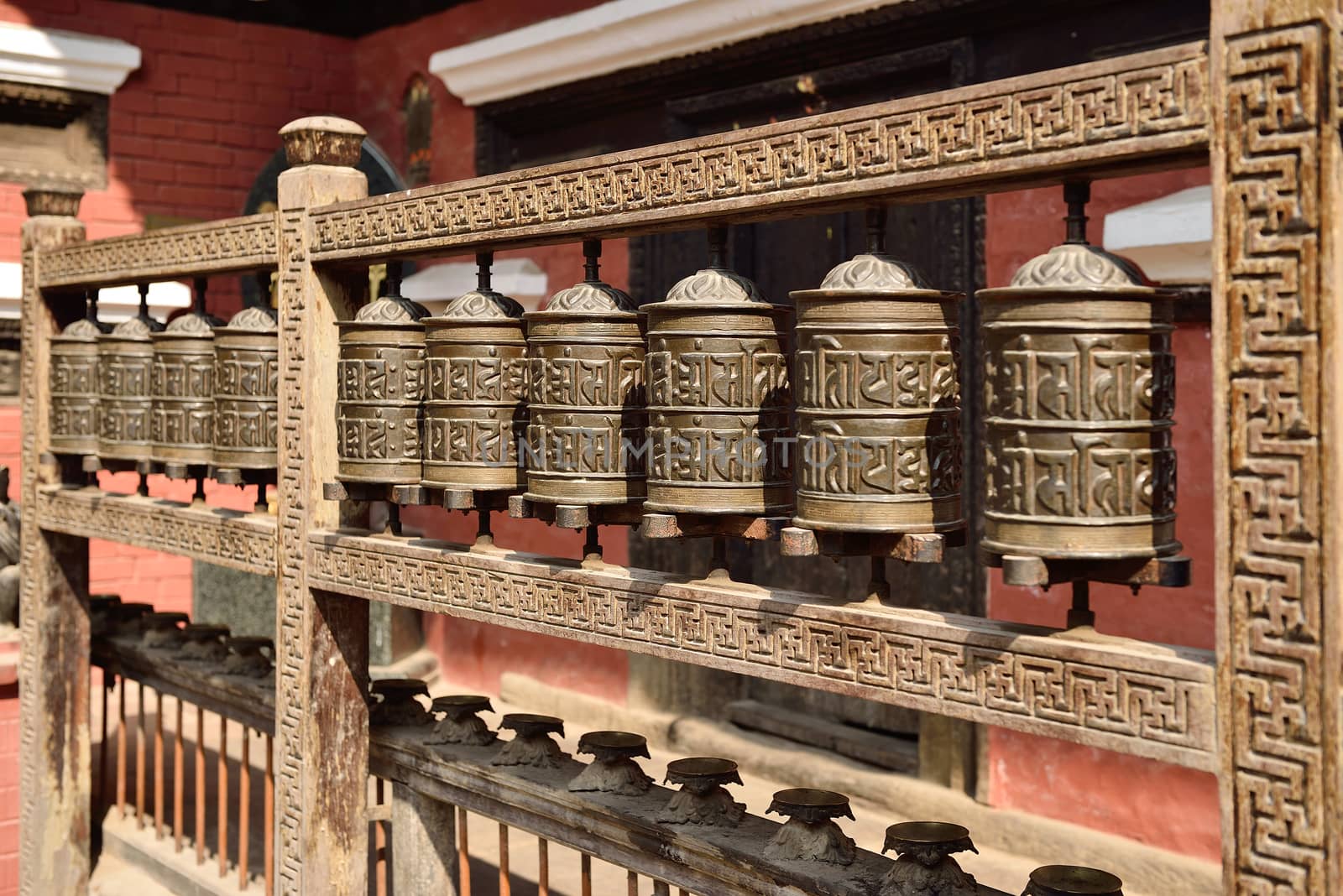 prayer wheels in the Rudravarna Mahavihar in patan, nepal by think4photop