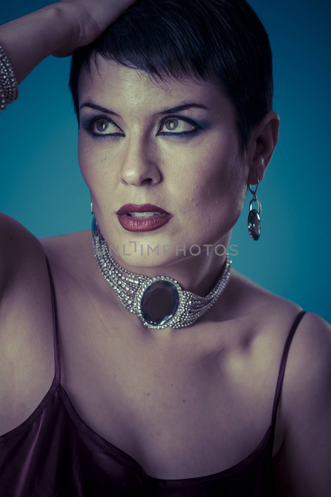 Lifestyle glamour, Sexy brunette with pearls and silver jewelry, by FernandoCortes