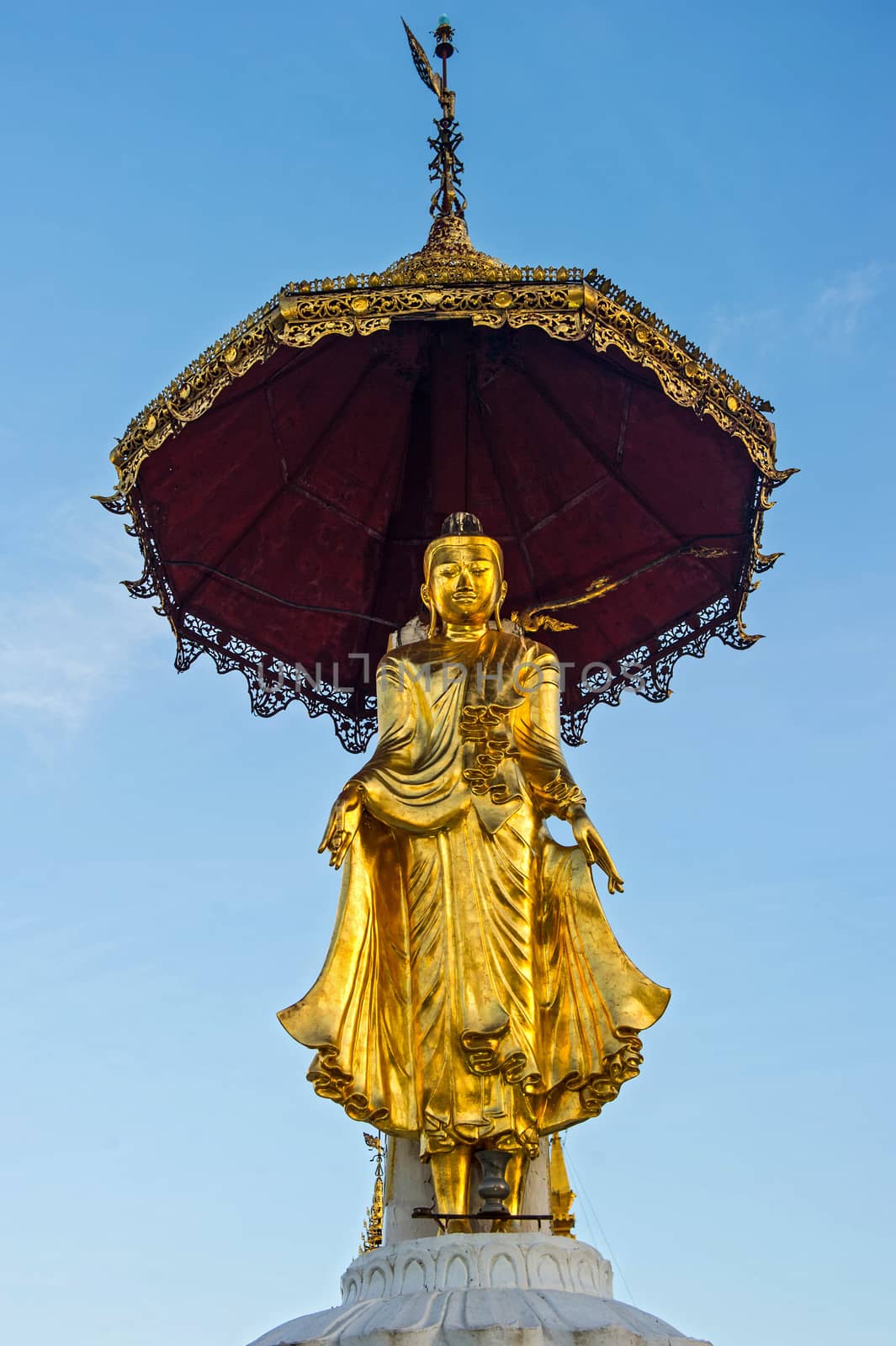 Buddha statue on top of pagoda around Shwedagon Pagoda - Yangon, by think4photop