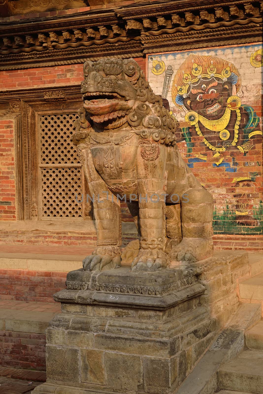 Sculptures at the durbar square, the center of patan, nepal by think4photop
