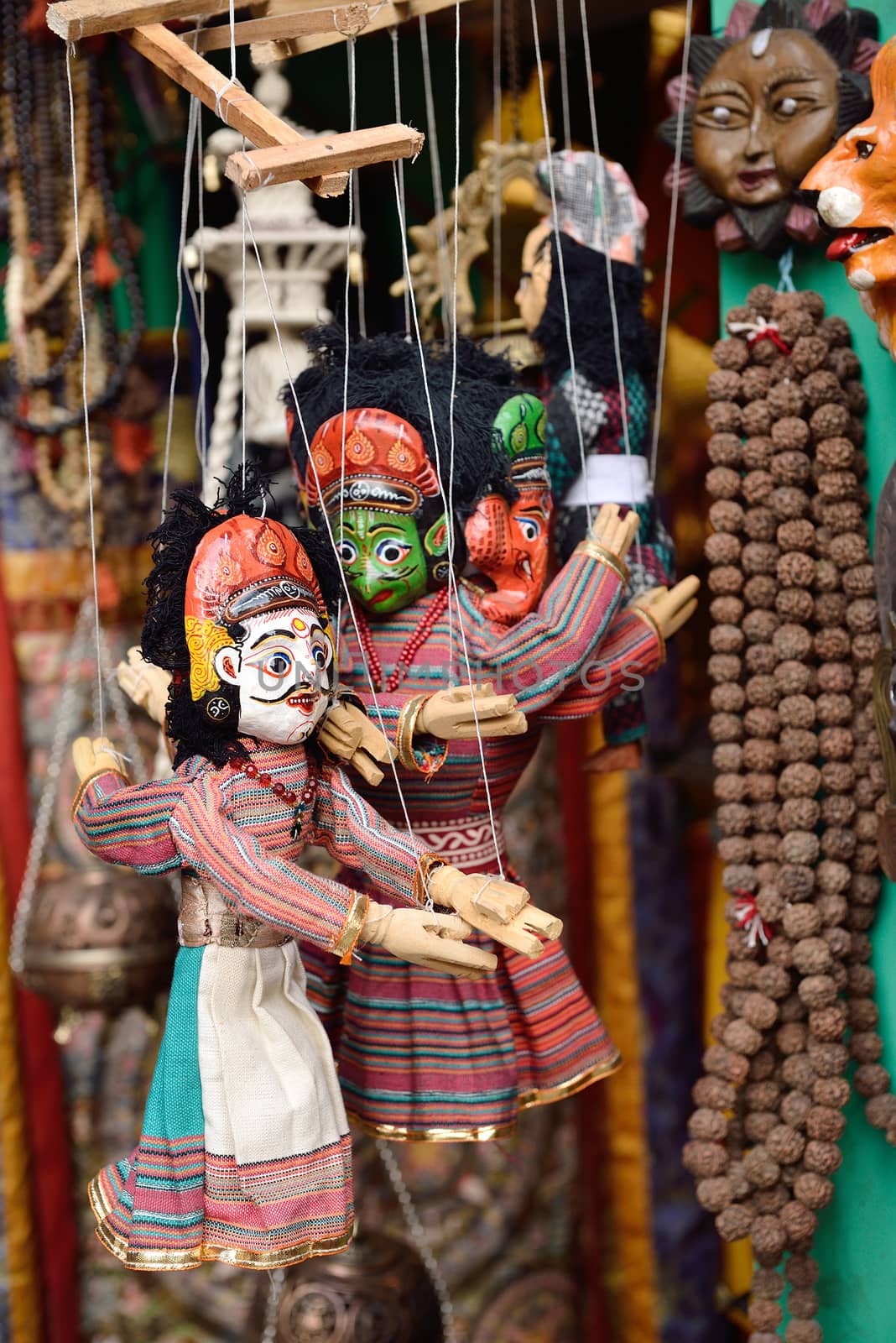 Colorful puppets on a market stall in Kathmandu, Nepal by think4photop