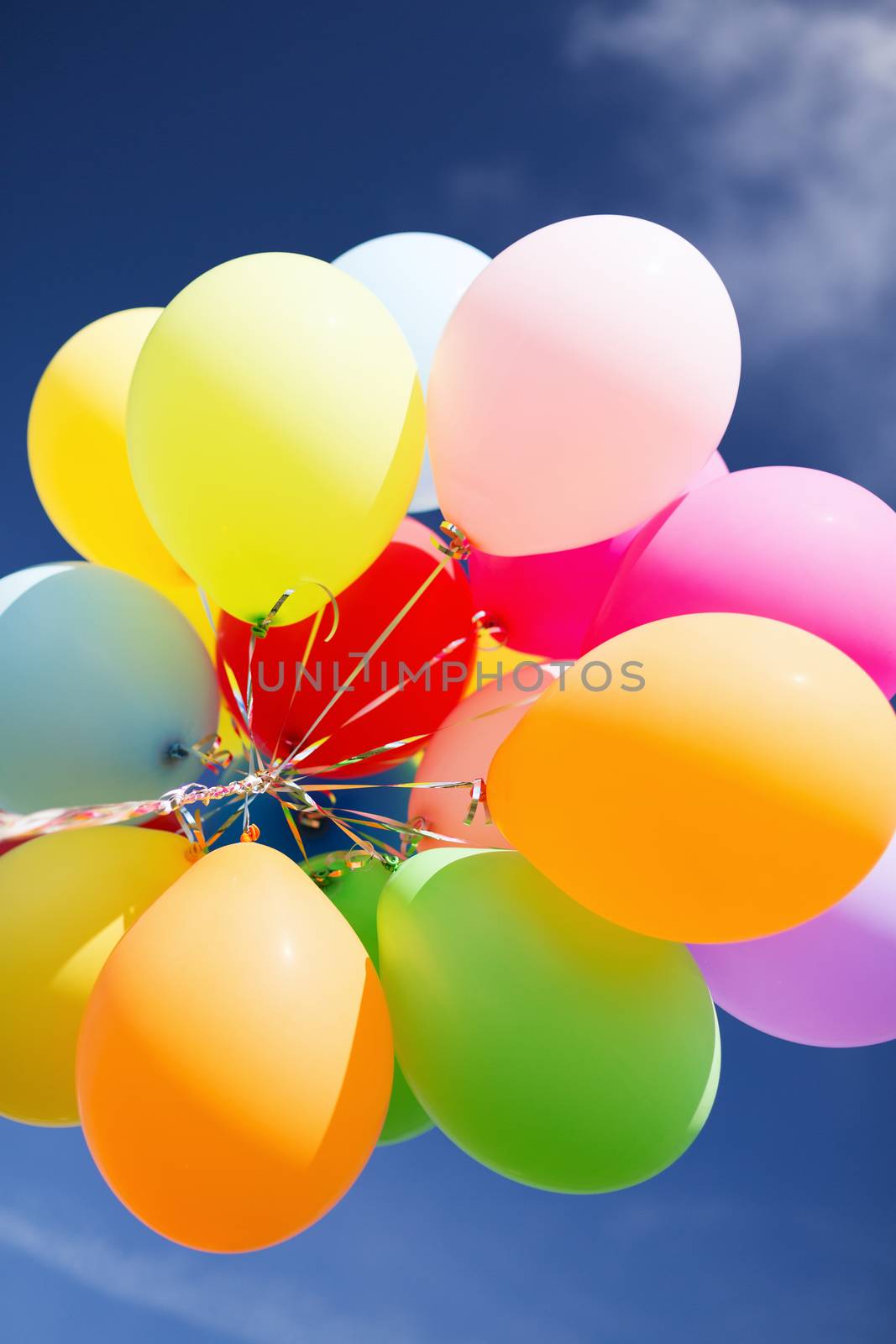 lots of colorful balloons in the sky by dolgachov