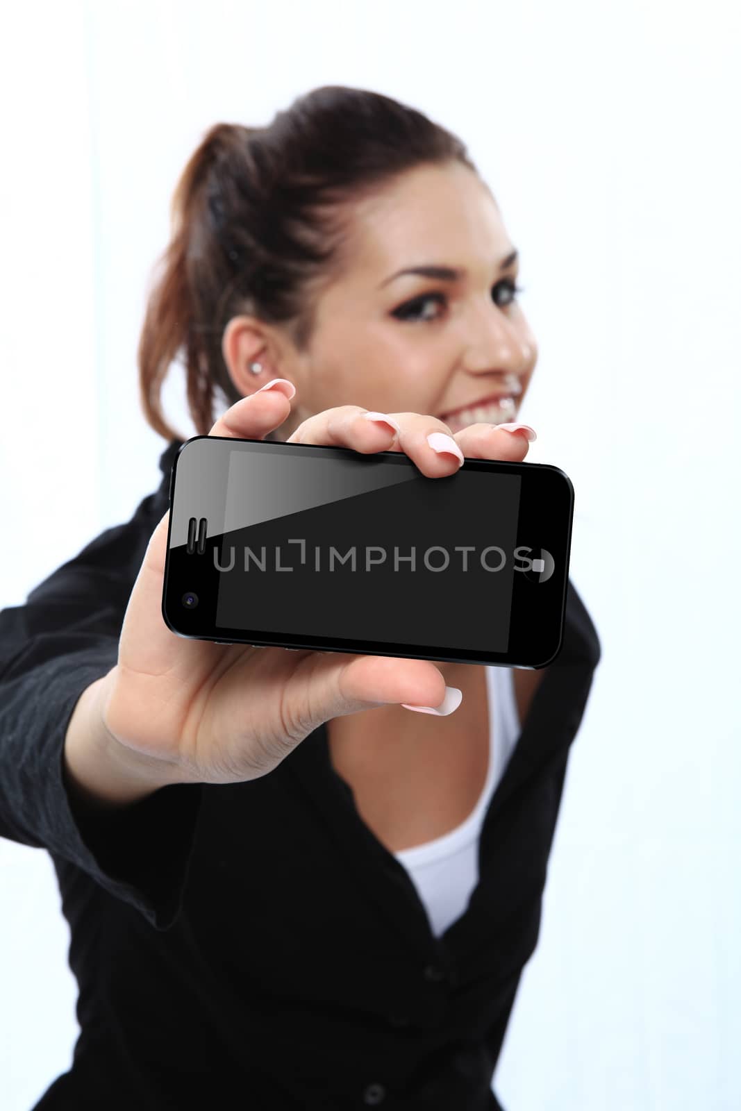 woman with blank smartphone in hand