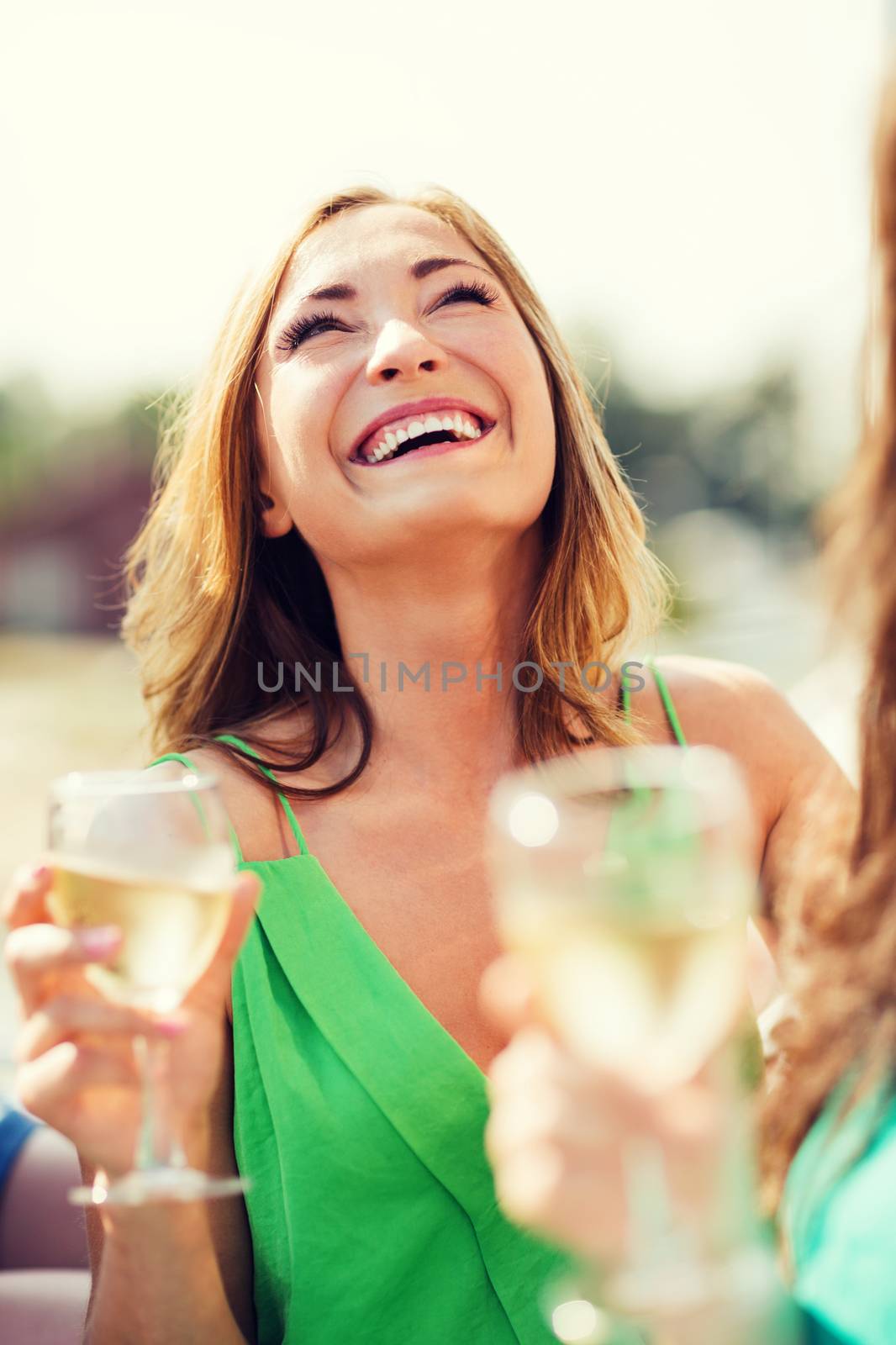 summer holidays, vacation and celebration - girl with champagne glass