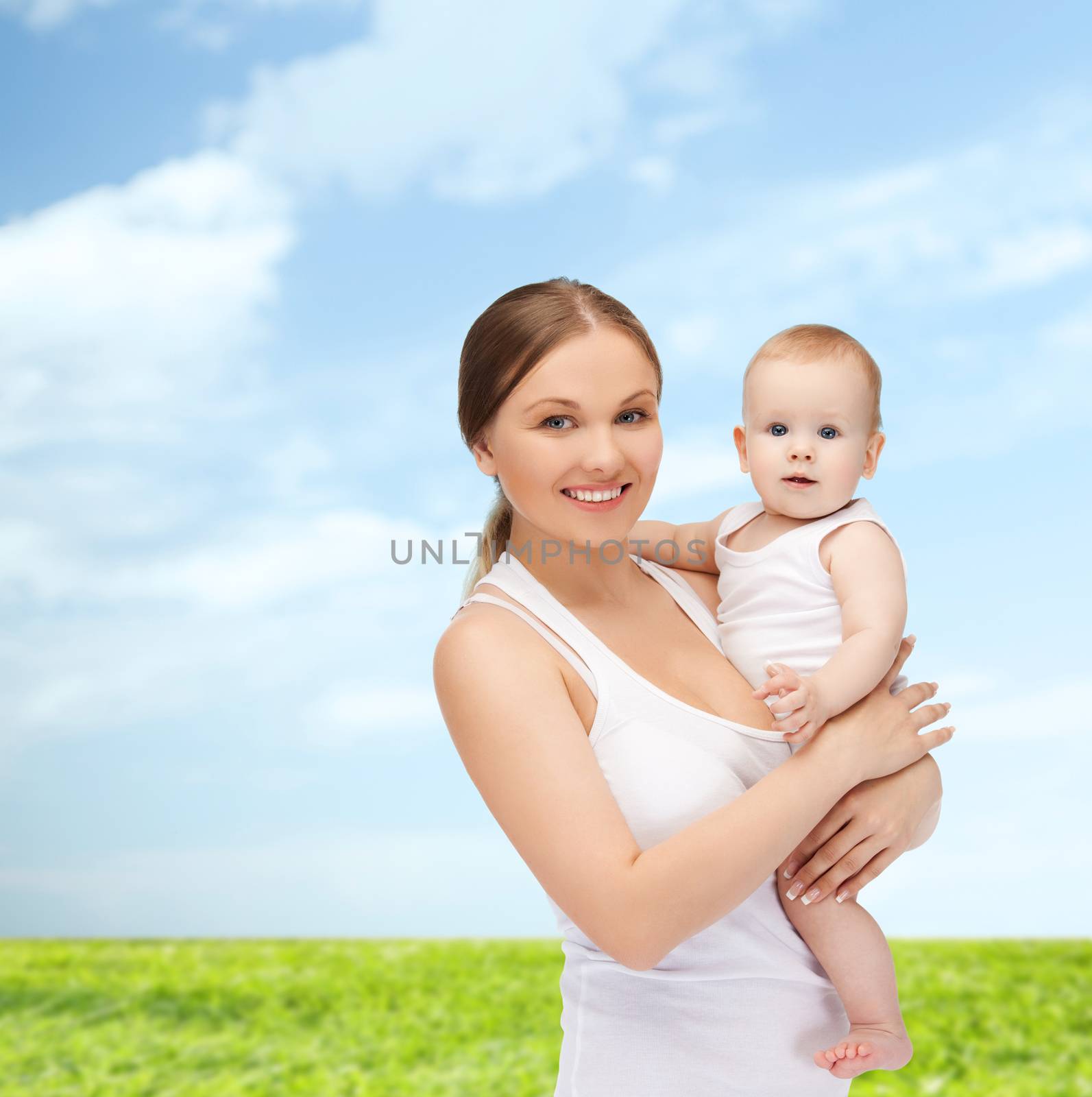 family, child and happiness concept - happy mother with adorable baby