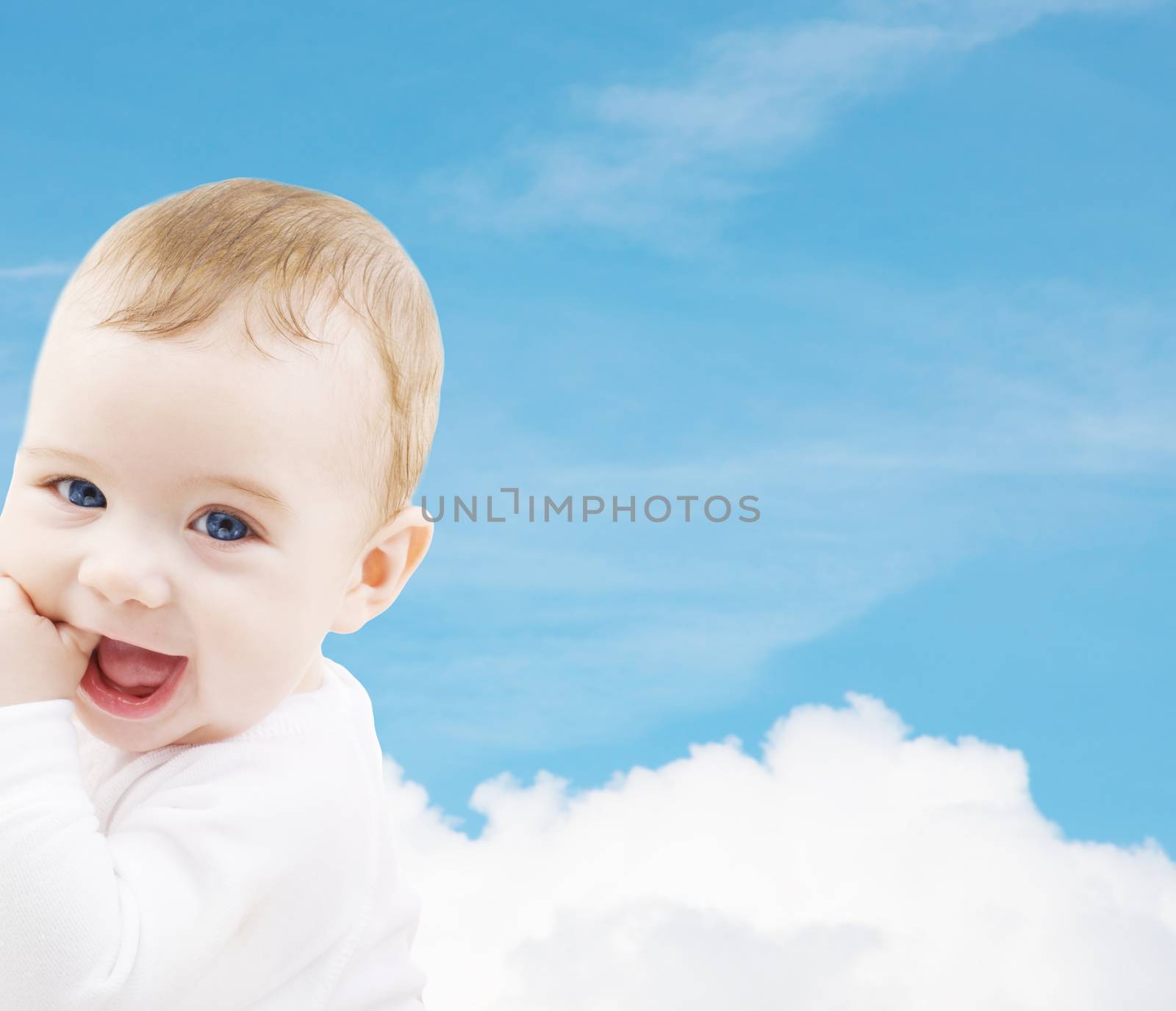 child, people and happiness concept - adorable baby boy