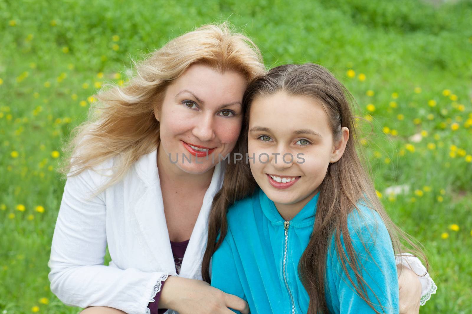portrait of mother and daughter outdoors