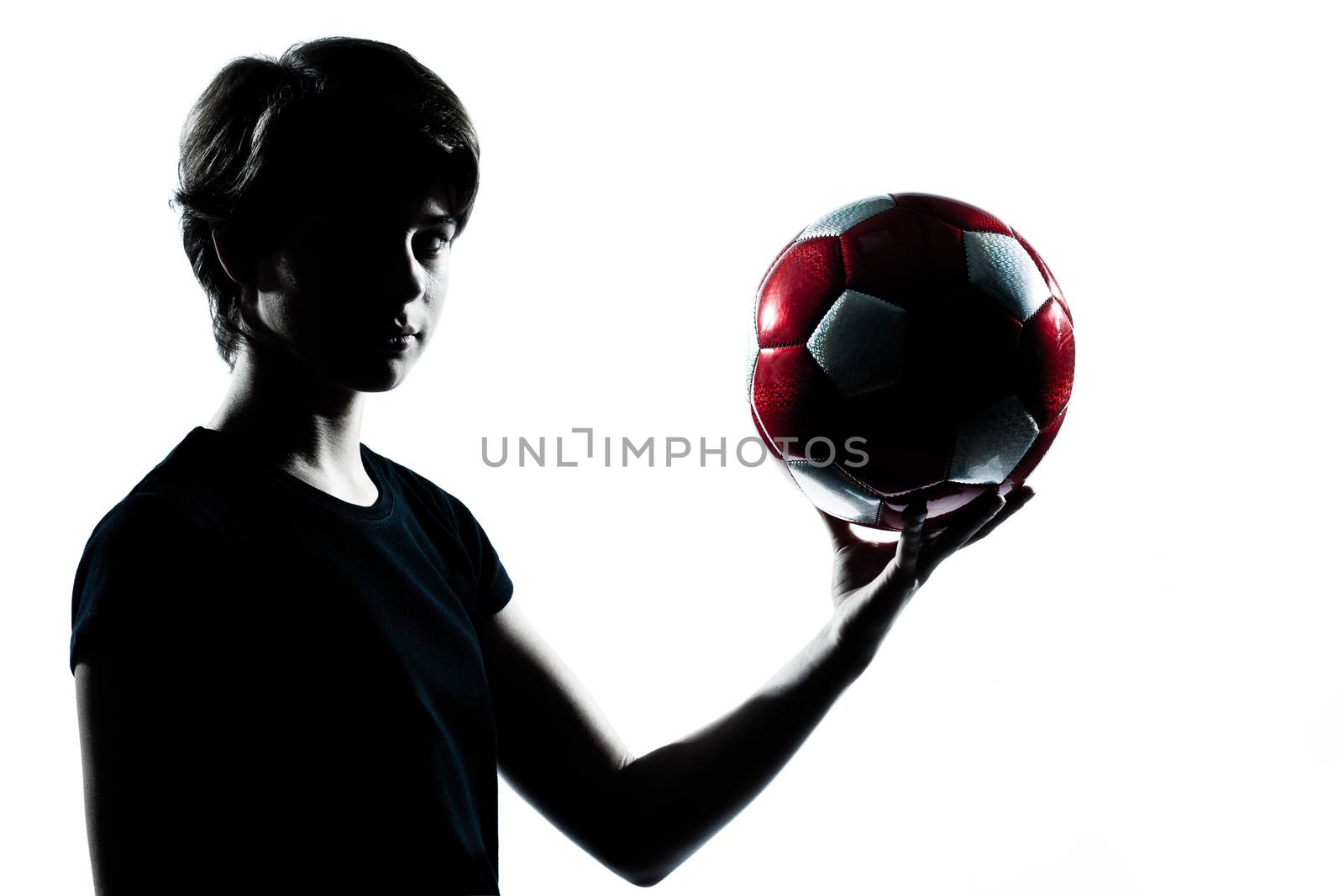 one  young teenager silhouette boy girl holding showing soccer football portrait in studio cut out isolated on white background