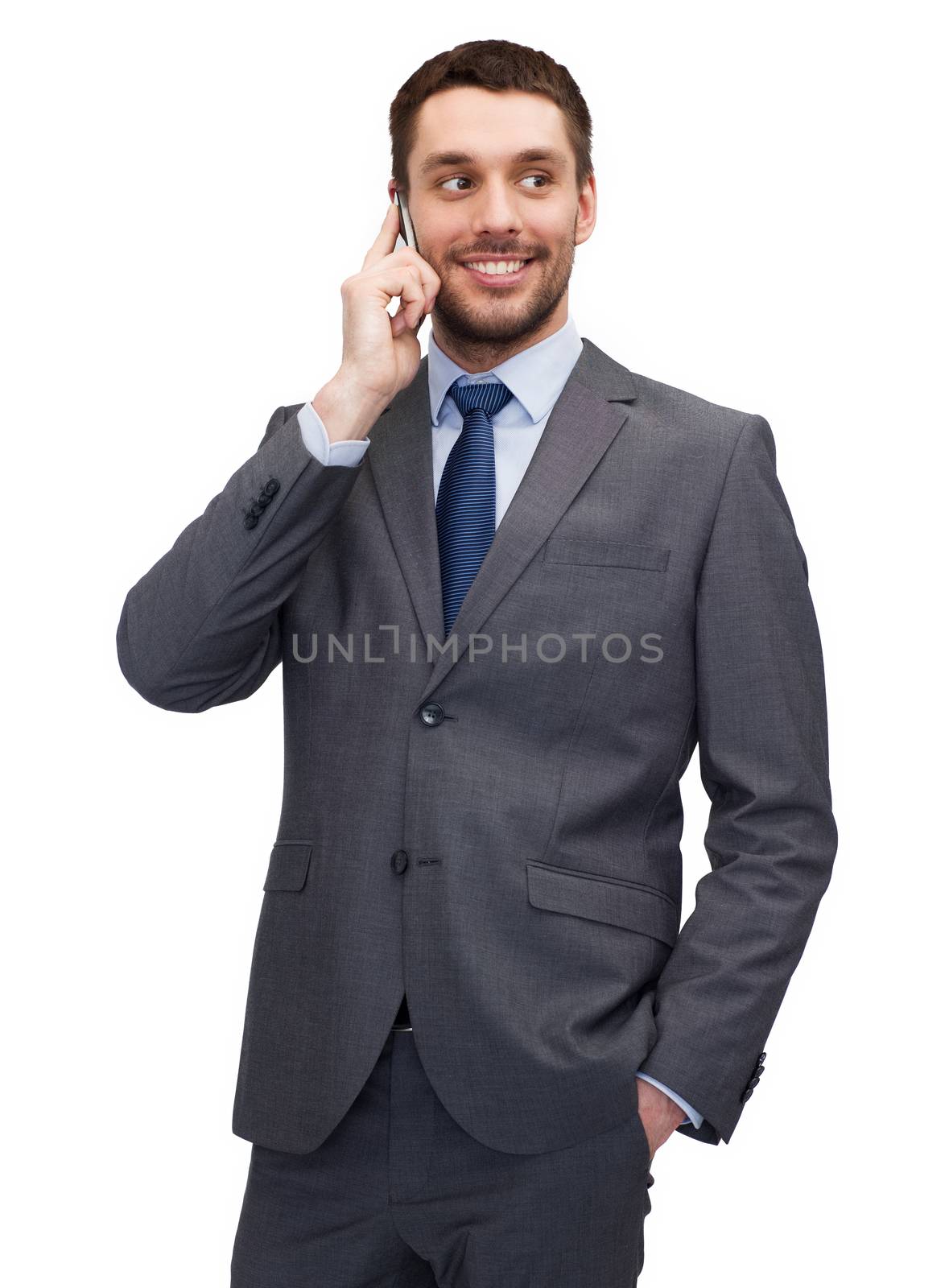 business, technology and education concept - friendly young smiling businessman with smartphone