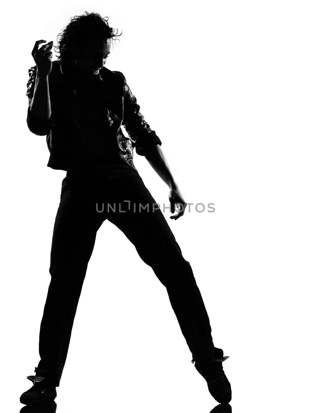 full length silhouette of a young man dancer dancing funky hip hop r&b on isolated studio white background