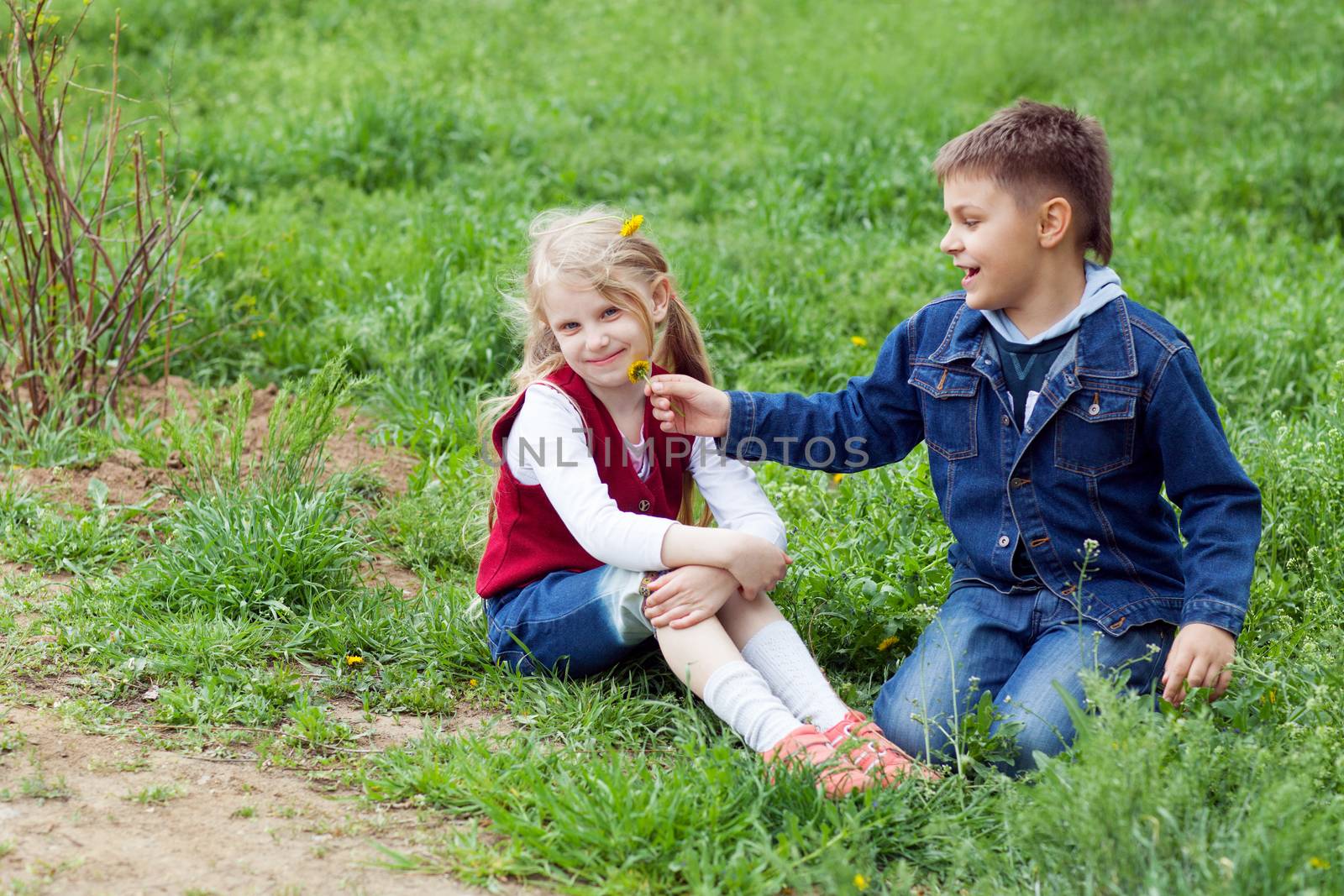 boy giving flowers to girl