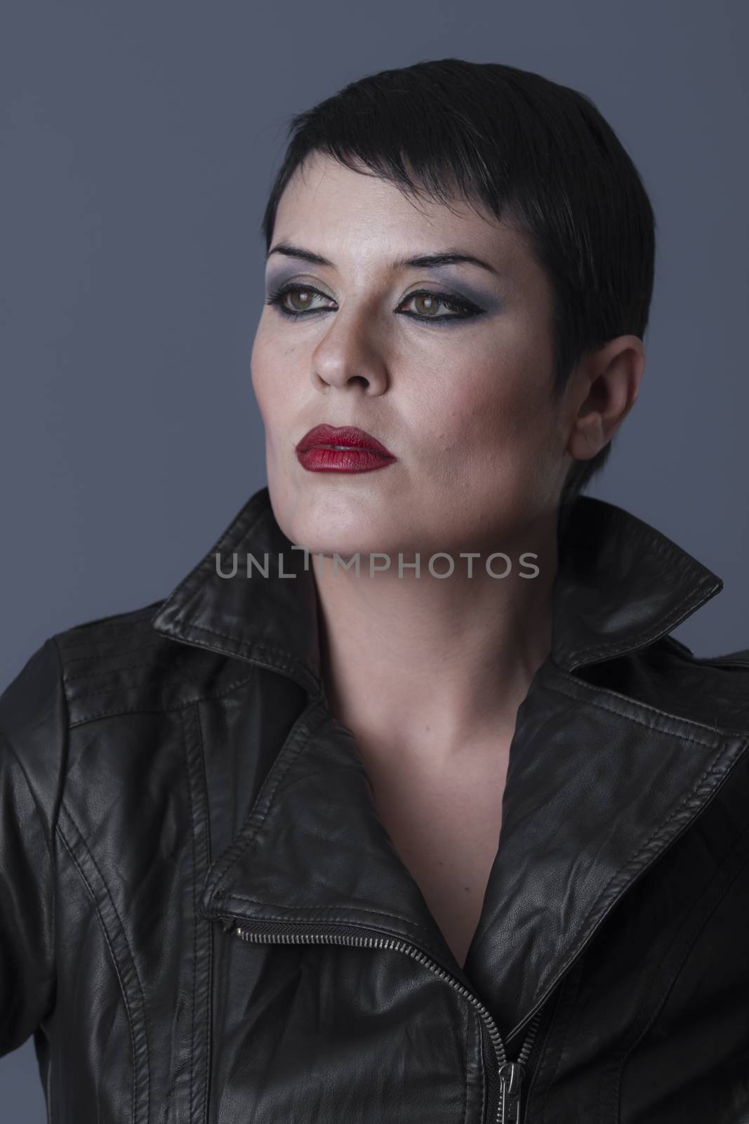 inconsiderate, sexy brunette biker with black leather jacket by FernandoCortes