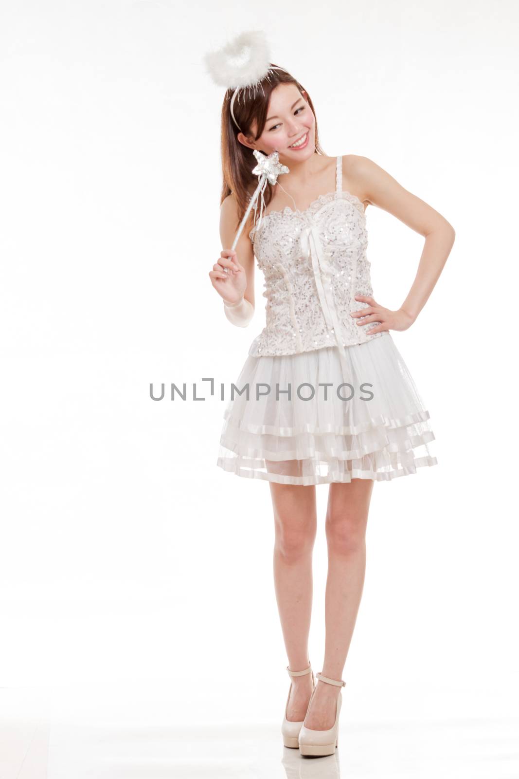 Smiling Asian Woman in White FairyCostume, isolated by imagesbykenny