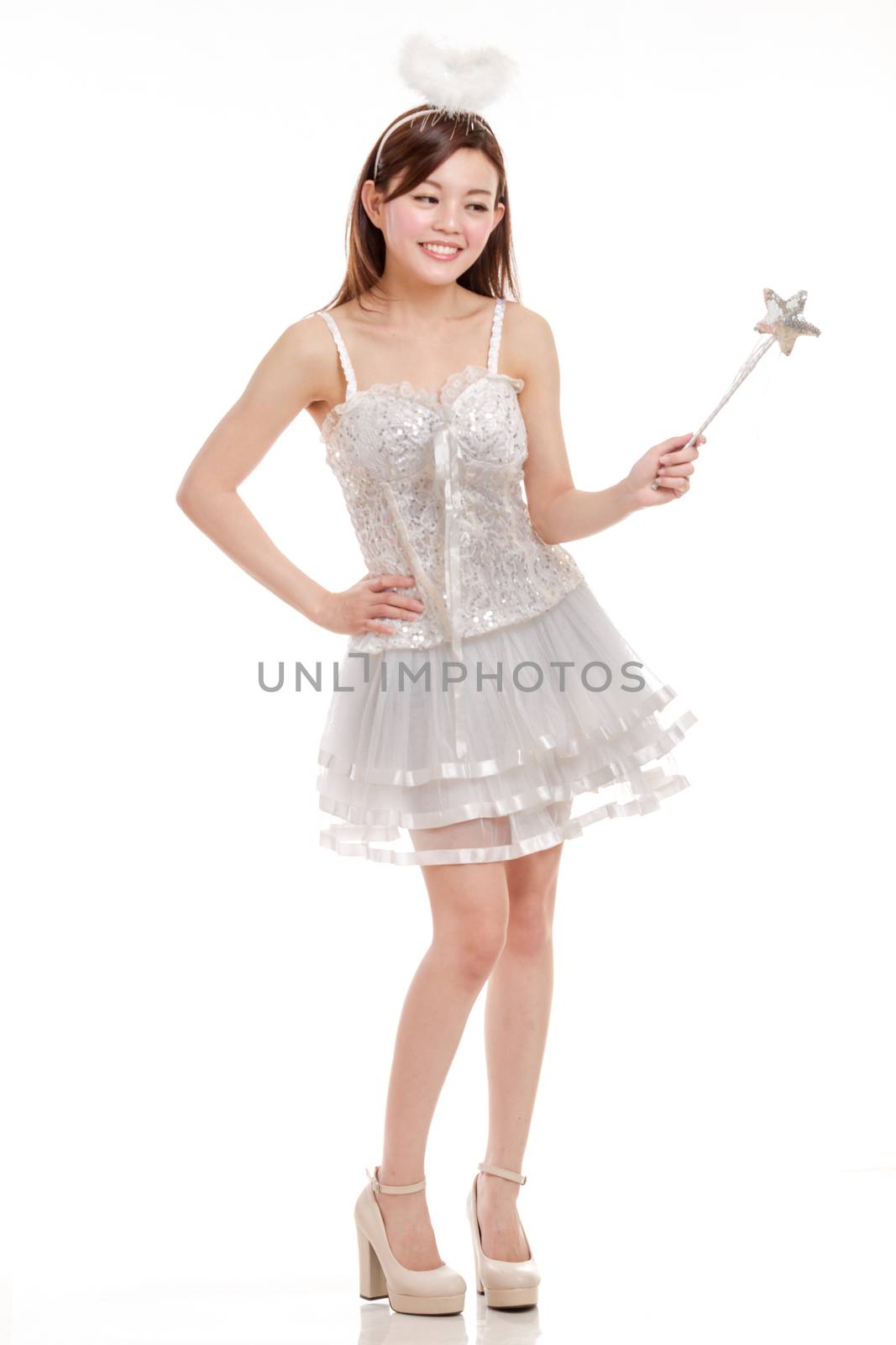 Malay woman in white angel fairy costume