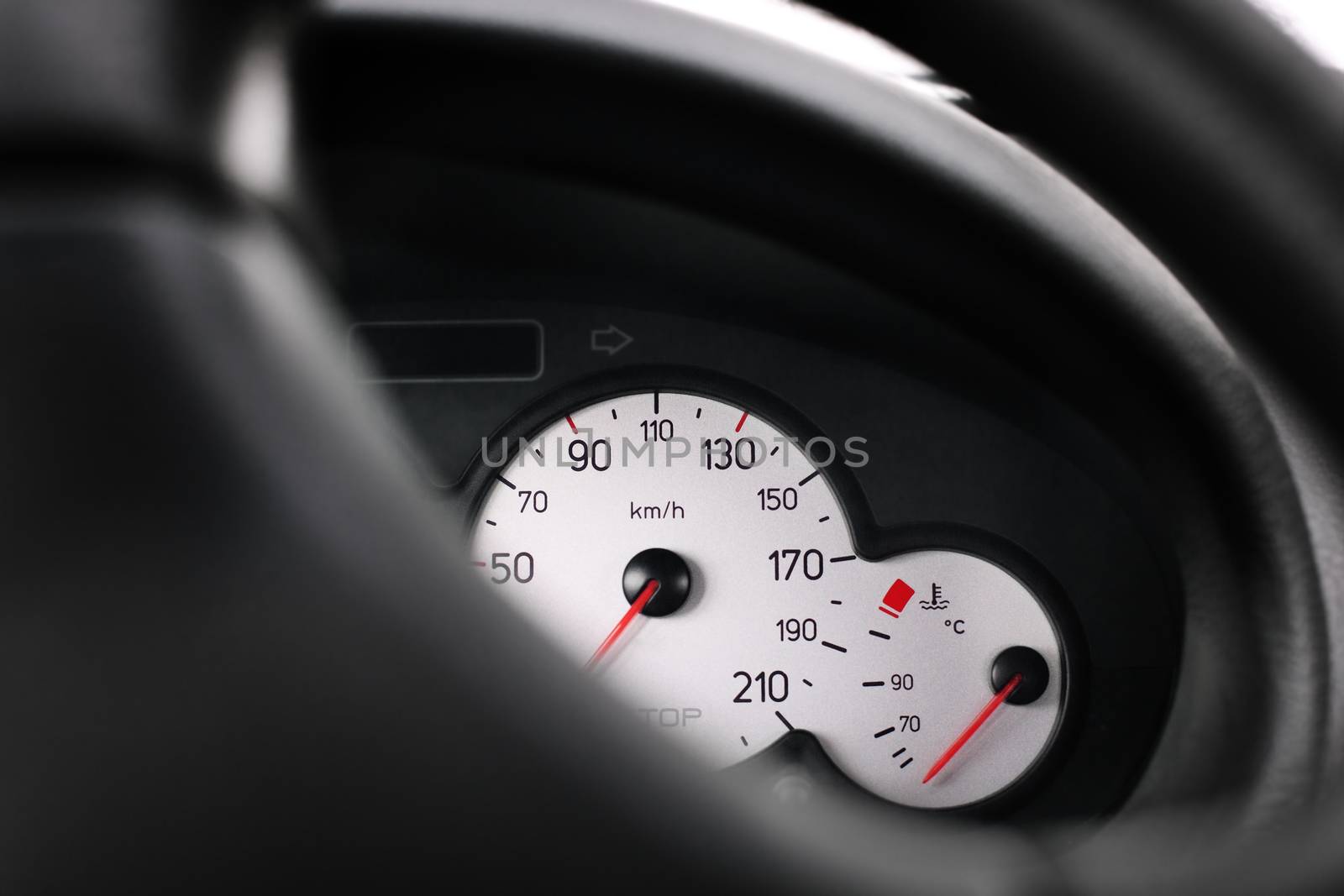Inside a car, odometer speed