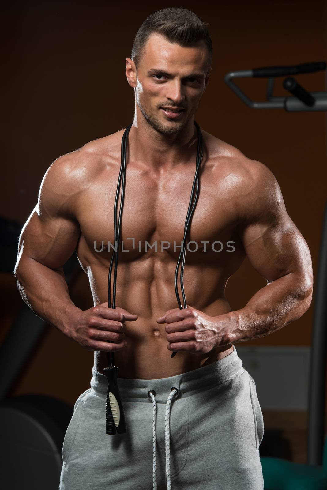 Handsome Muscular Men With Jumping Rope by JalePhoto