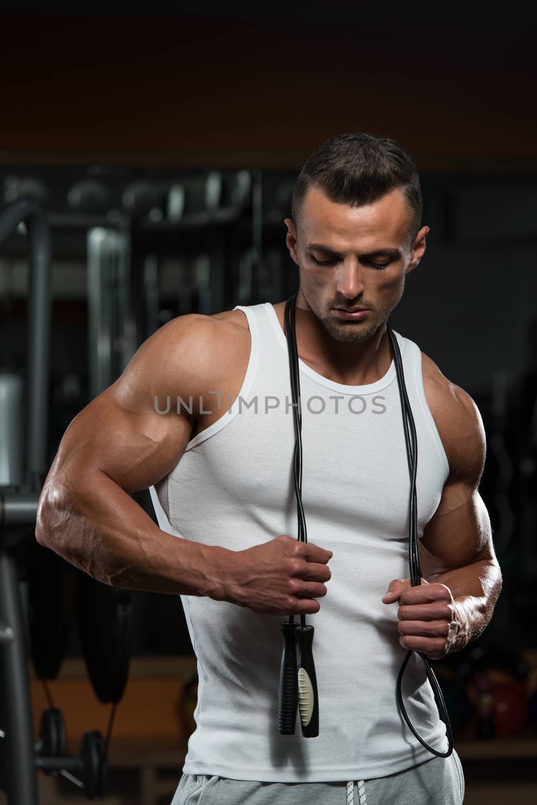 Handsome Muscular Men With Jumping Rope by JalePhoto
