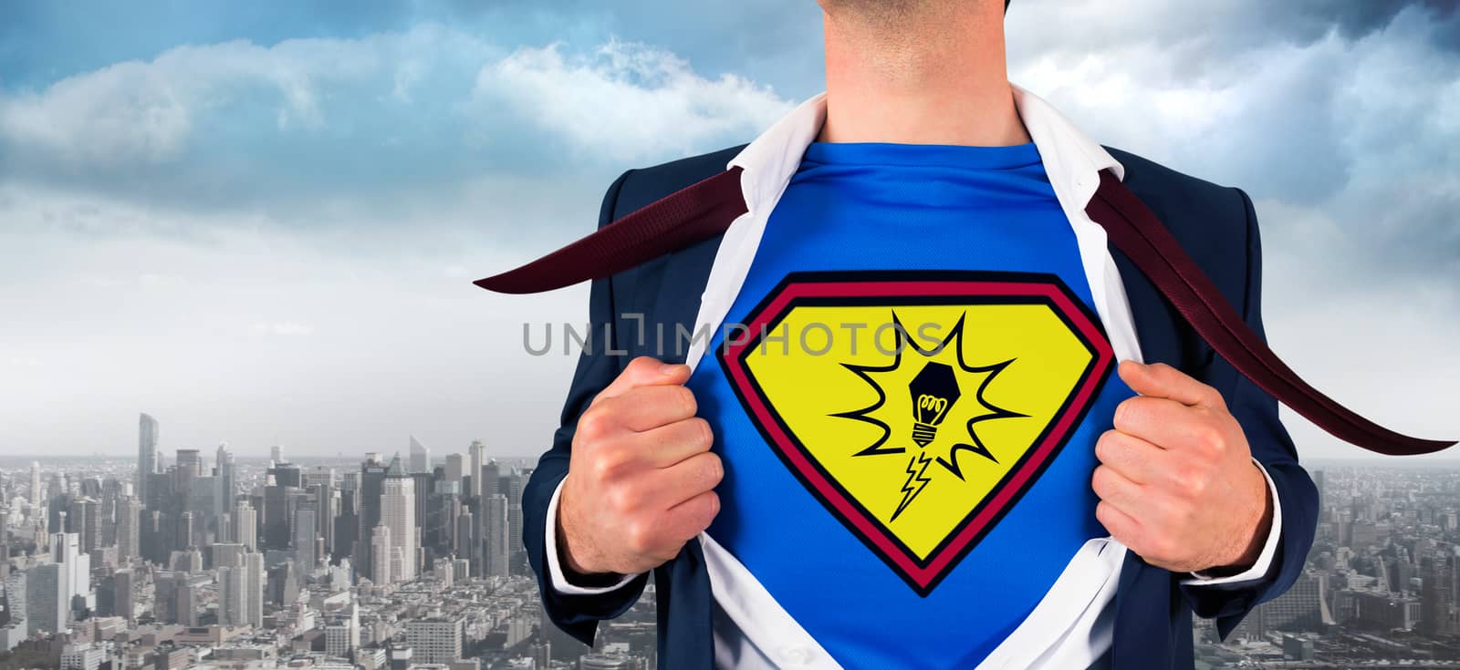 Businessman opening shirt in superhero style against balcony overlooking city