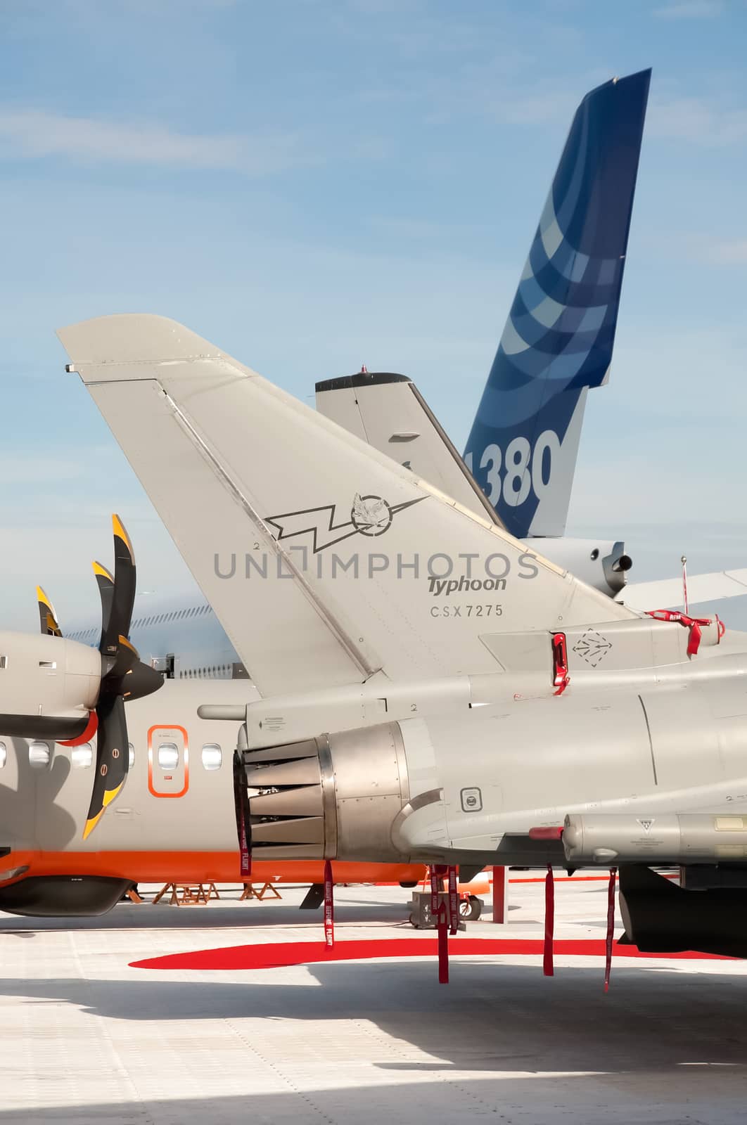 Farnborough, UK - July 24, 2010: Military and commercial aircraft tails on display at the Farnborough Airshow, Hampshire, UK