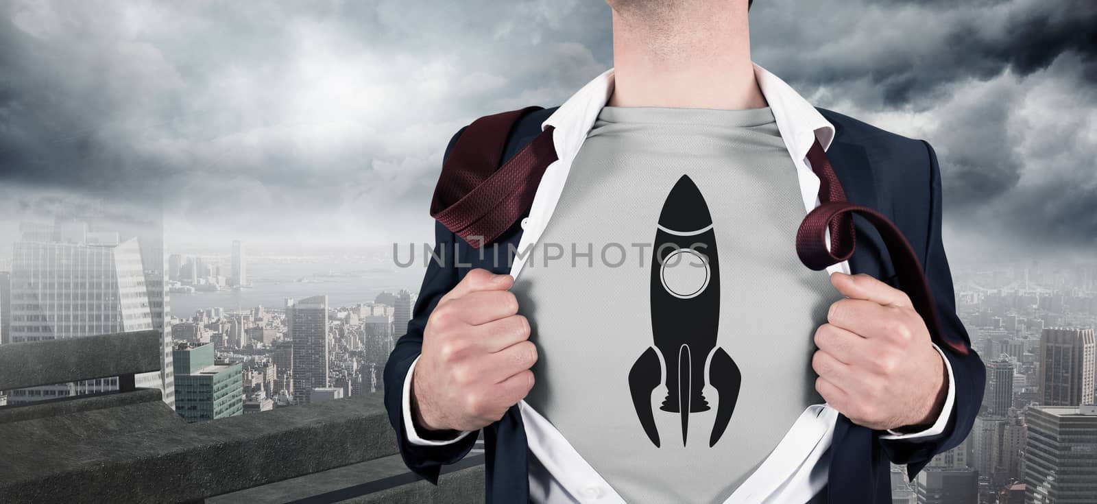 Businessman opening shirt in superhero style against balcony overlooking city