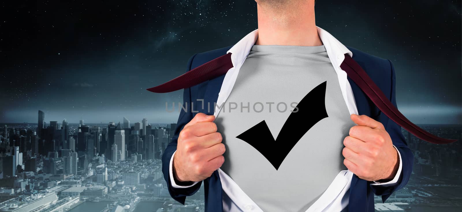 Businessman opening shirt in superhero style against balcony overlooking city