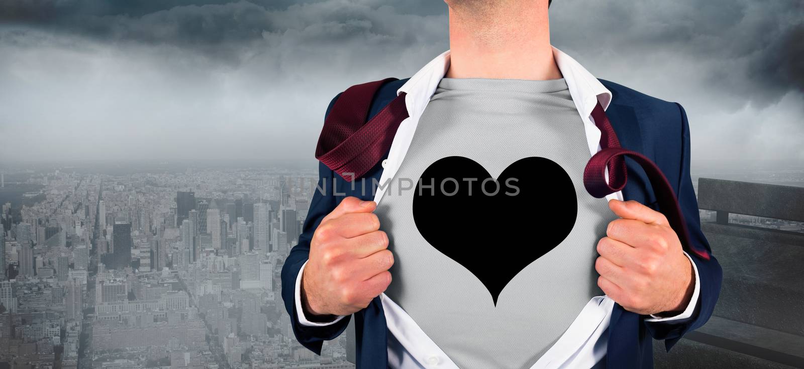 Composite image of businessman opening shirt in superhero style against gloomy city