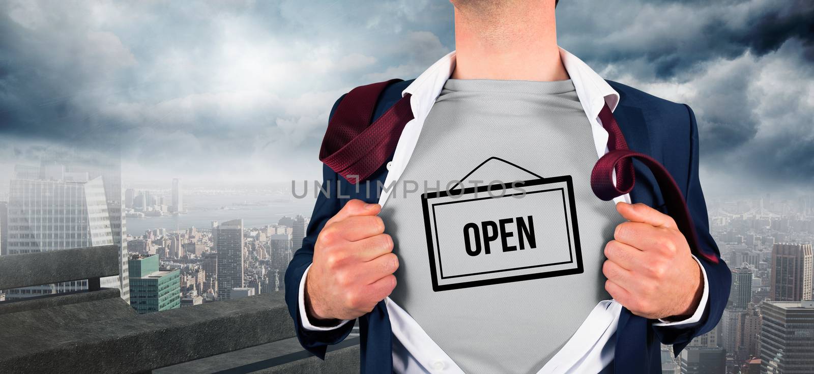 Composite image of businessman opening shirt in superhero style by Wavebreakmedia