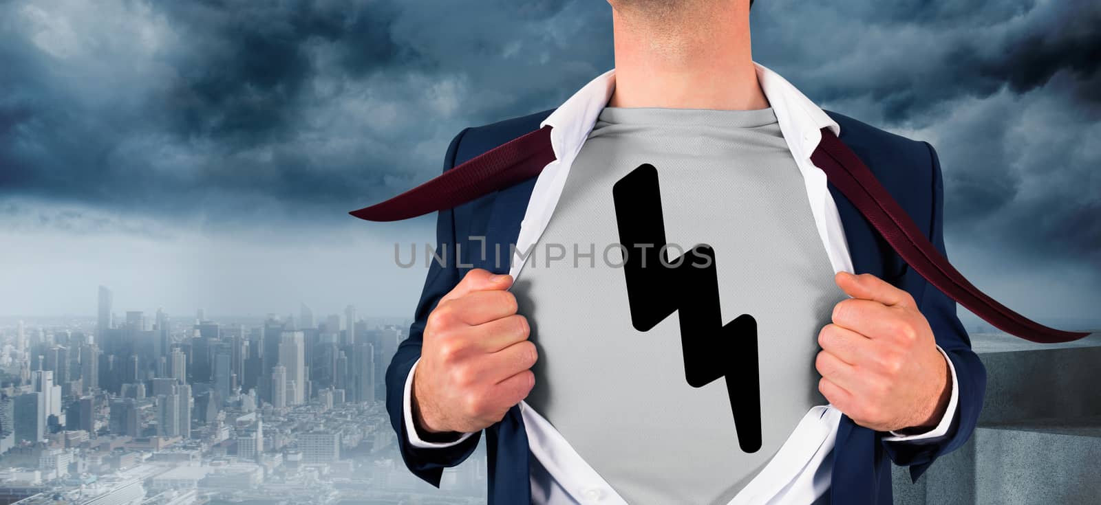 Composite image of businessman opening shirt in superhero style by Wavebreakmedia