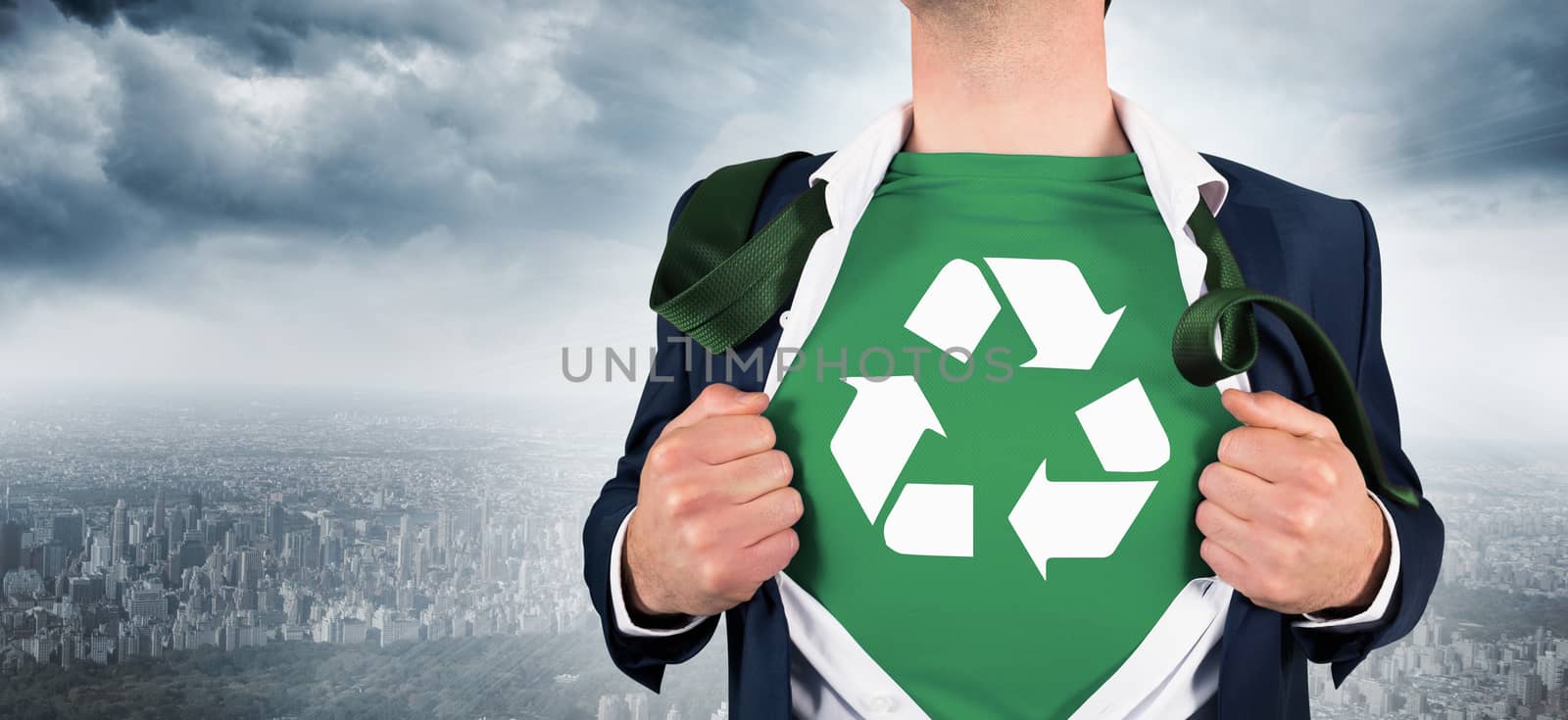 Composite image of businessman opening shirt in superhero style by Wavebreakmedia