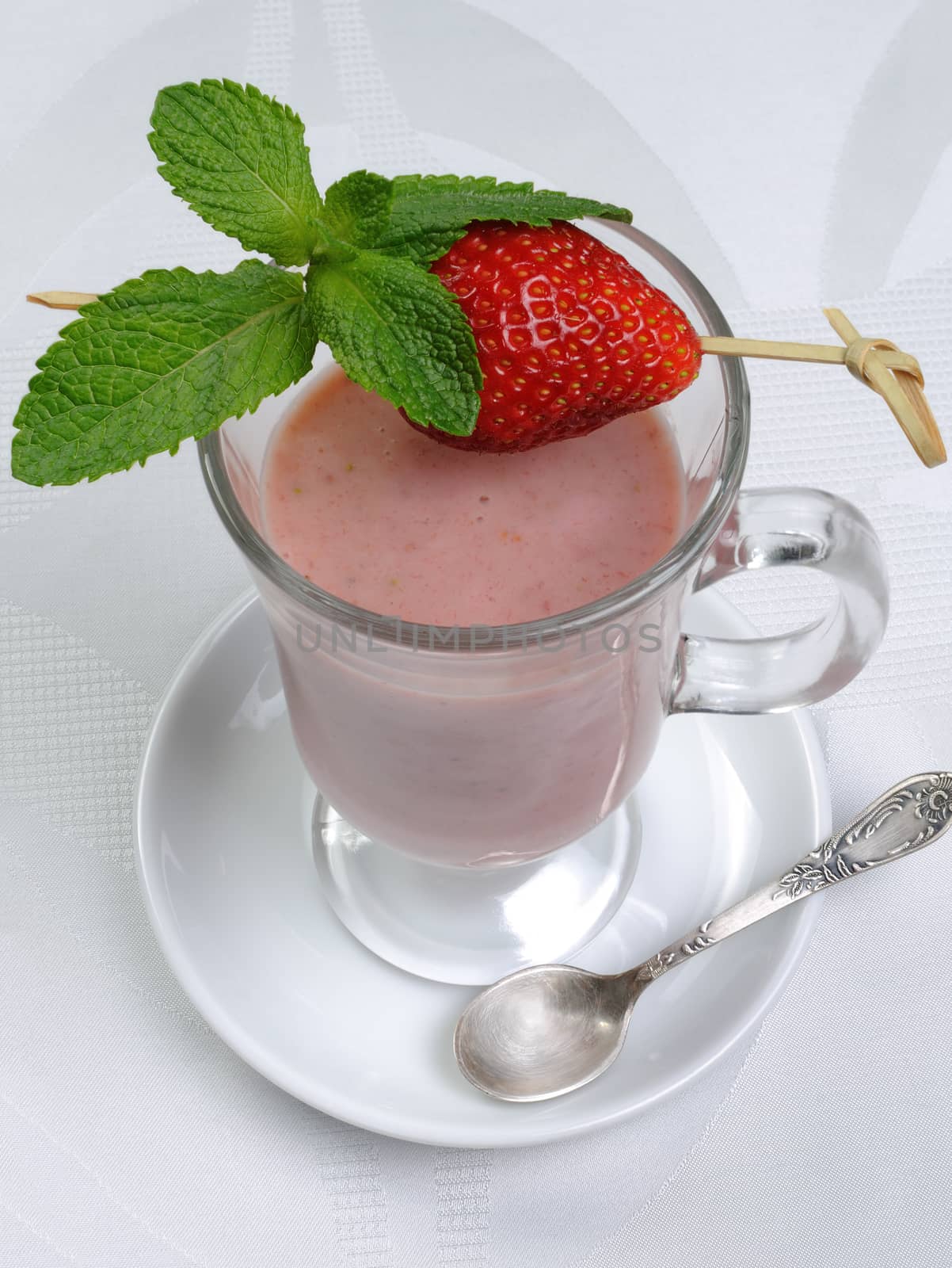 Milkshake of banana and fresh strawberries