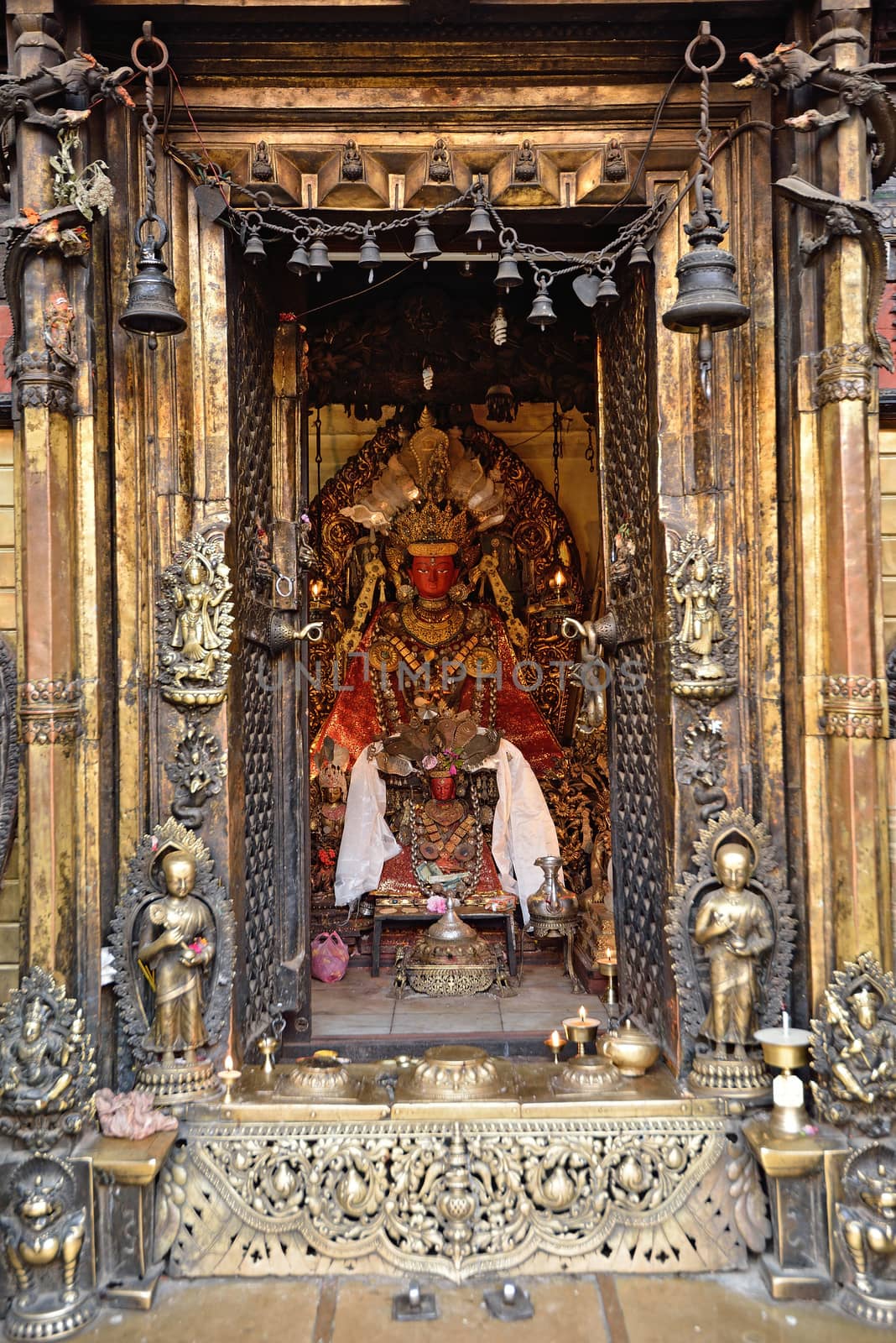 statue in Rudravanar Mahavihar, Kathmandu, Nepal by think4photop