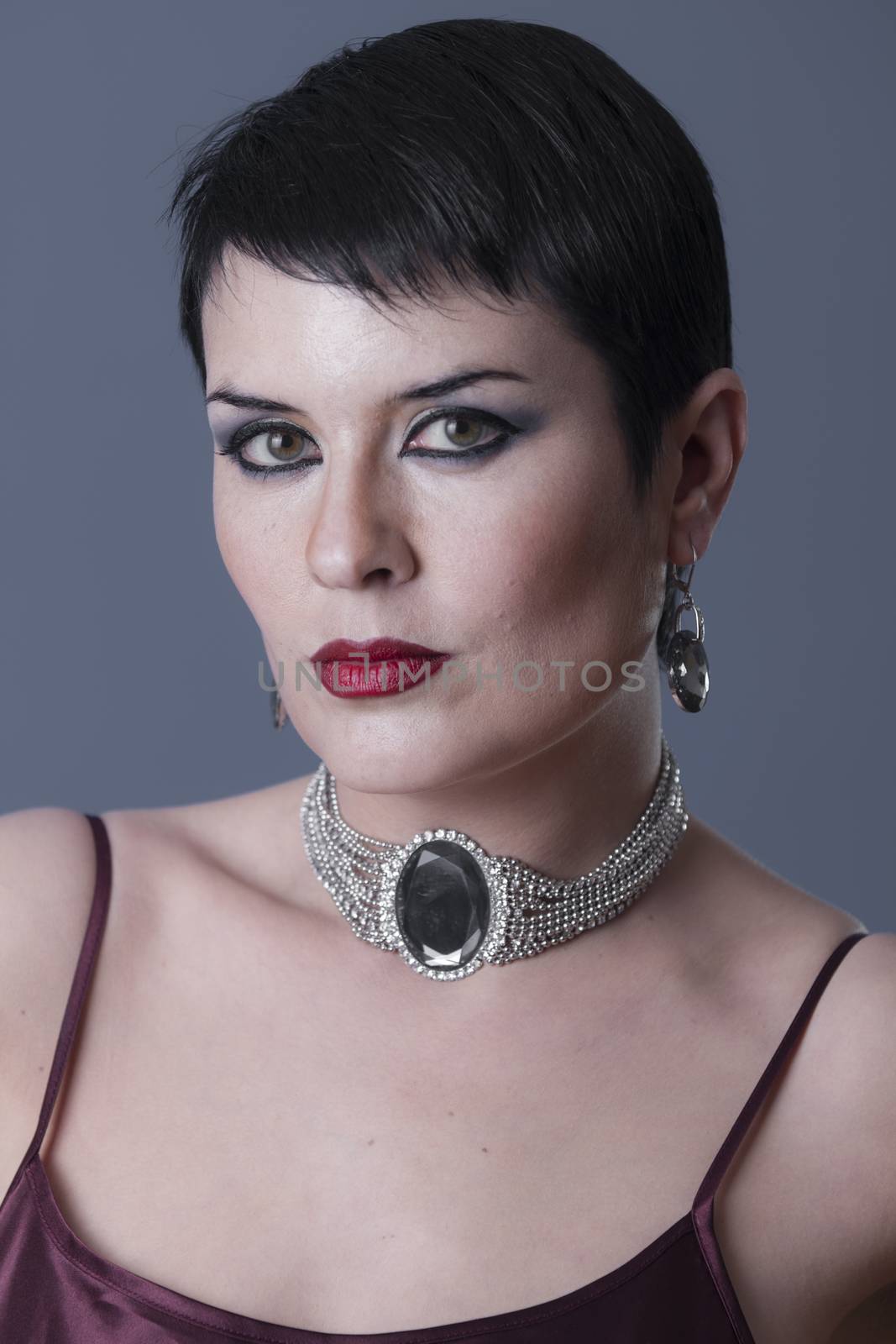 Sexy brunette with pearls and silver jewelry, luxury, money by FernandoCortes