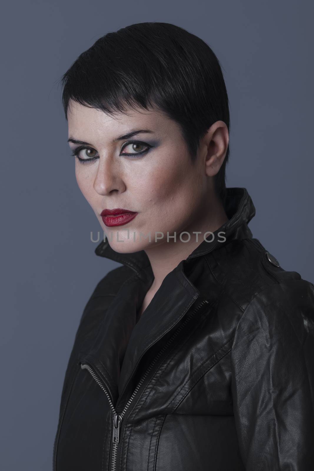 rebellious, sexy brunette biker with black leather jacket by FernandoCortes
