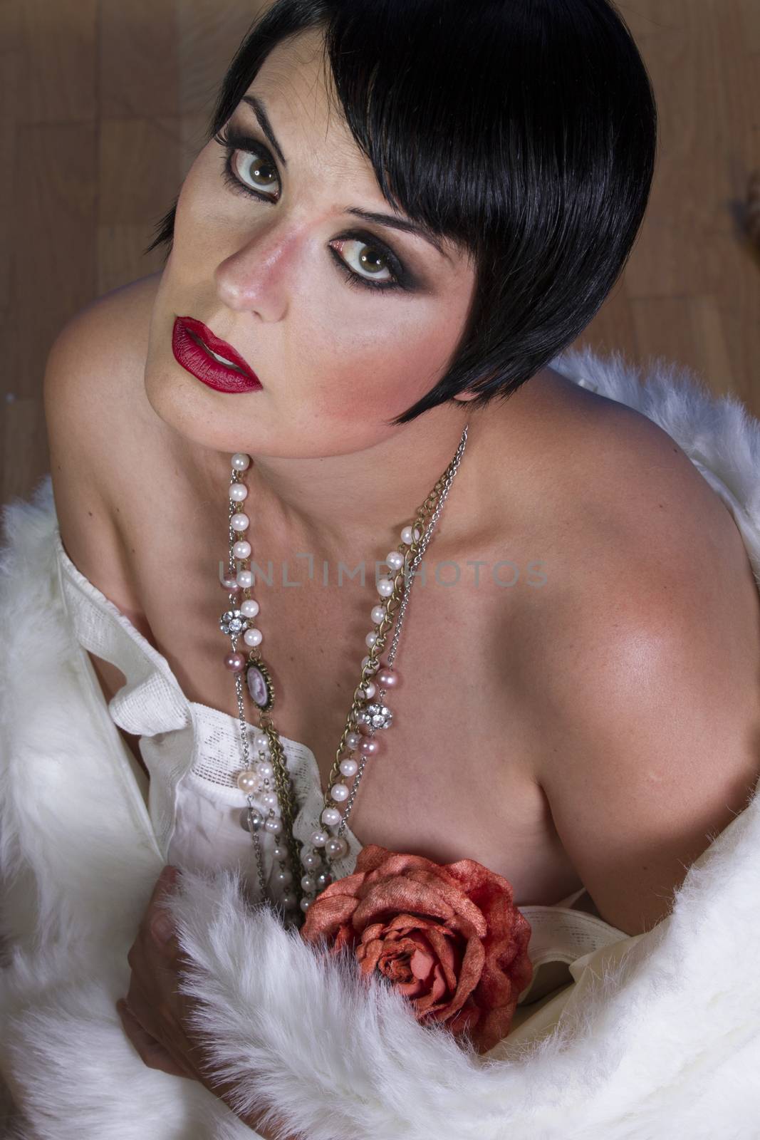 Retro, beautiful sexy brunette woman dressed in 20s style, hairs by FernandoCortes