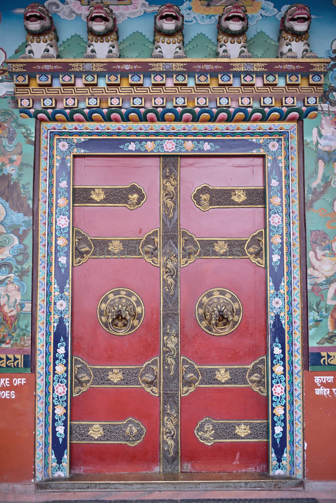 A Door of temple near Boudhanath buddhist stupa in Kathmandu capital of Nepal