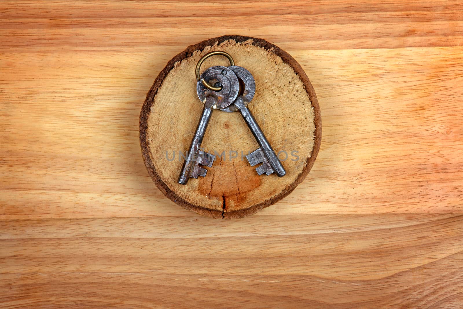 Old Keys on the Wooden Background