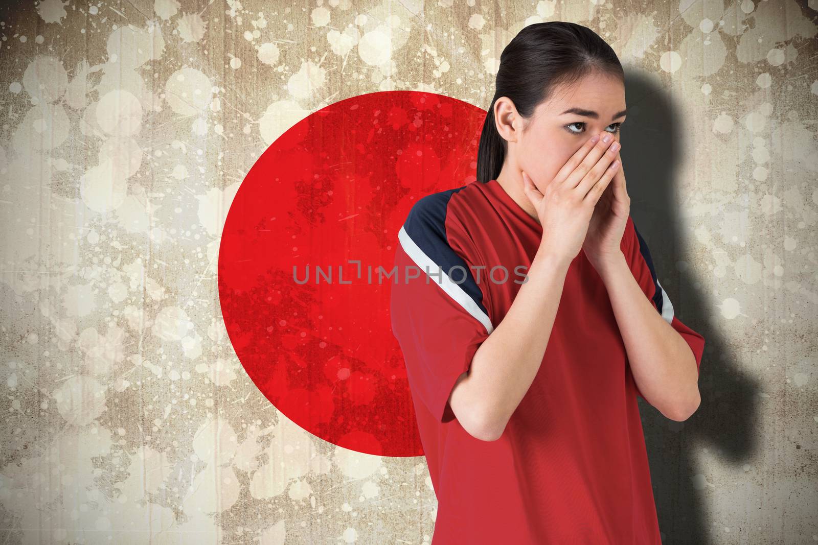 Nervous football fan looking ahead by Wavebreakmedia