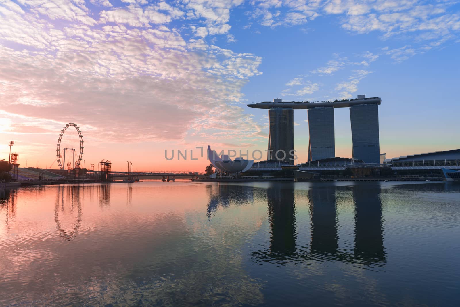 Morning in the modern city skyline with iconic Singapore buildings in Marina Bay