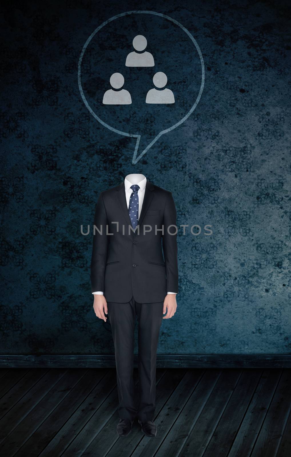 Composite image of headless businessman with speech bubble against dark grimy room