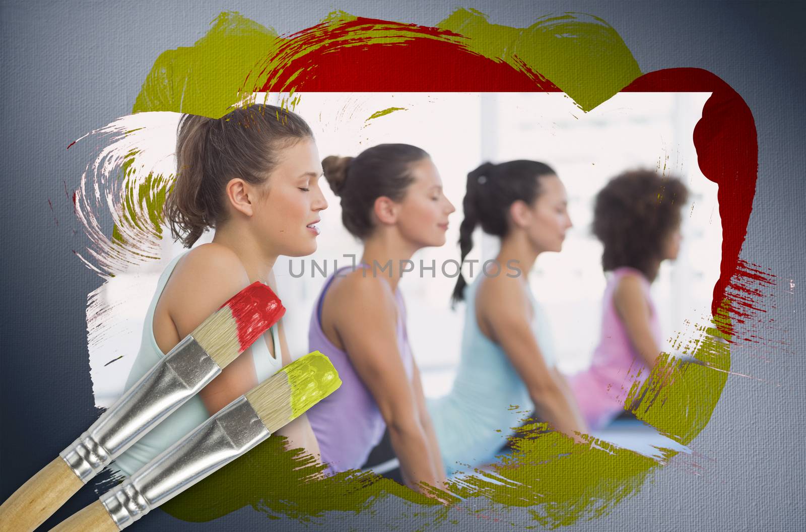 Composite image of yoga class in the gym with paintbrush dipped in yellow against digitally generated grey vignette background