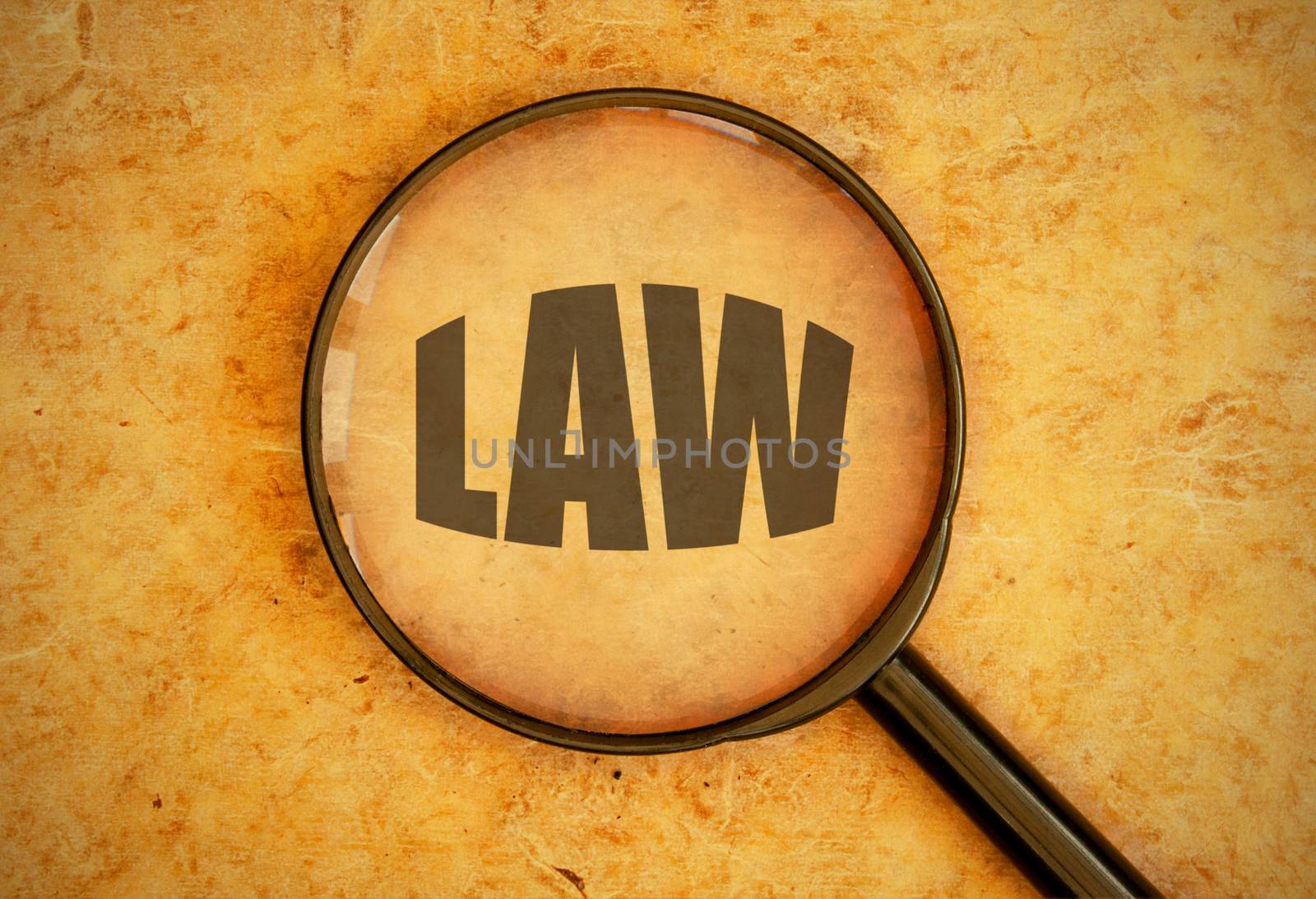 Magnifying glass focused on law heading