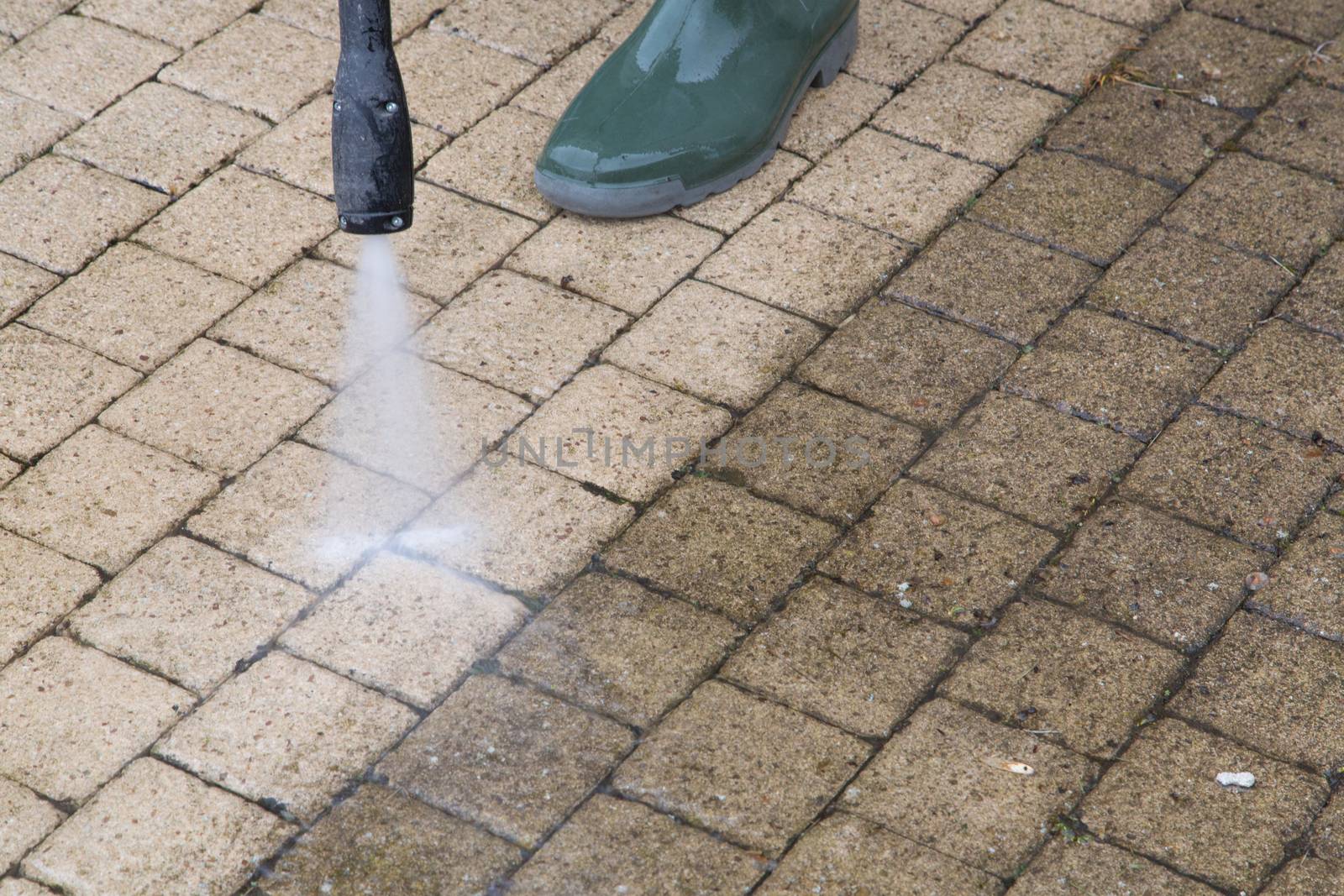 Outdoor floor cleaning with high pressure water jet