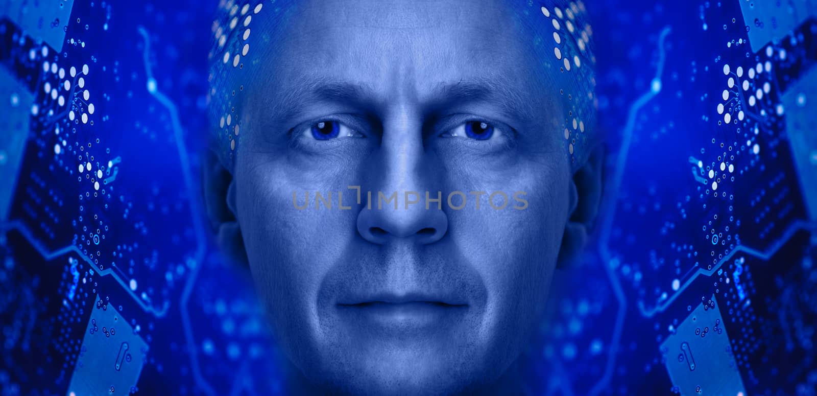 Men portrait on a electronic circuit board background. Toned blue.