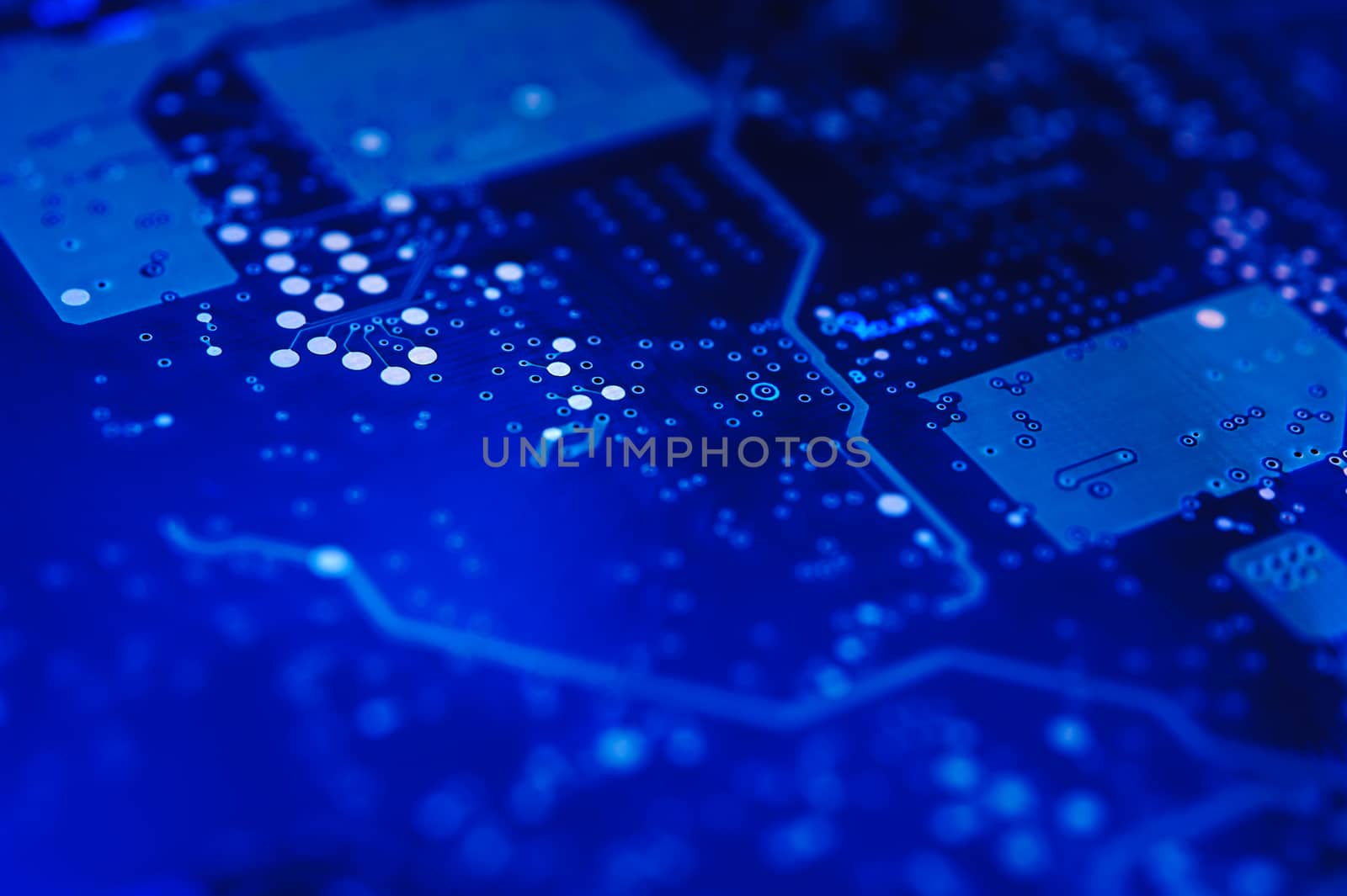 High-tech background. Electronic circuit board. Macro. Selective focus.