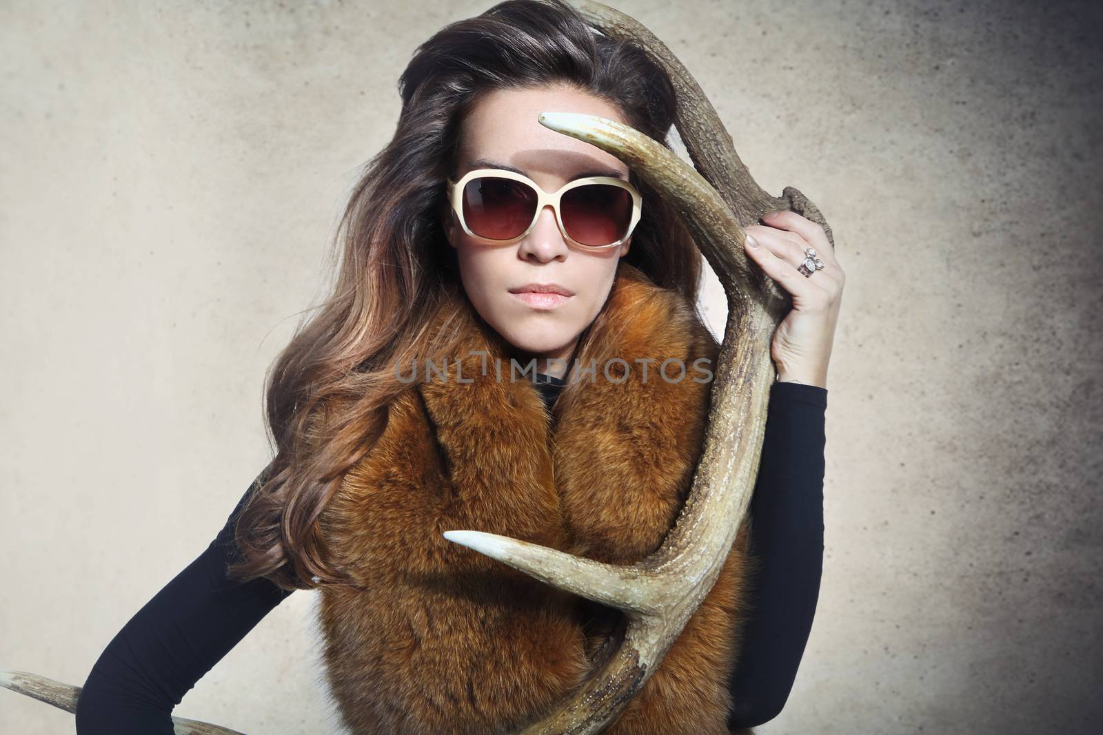An elegant woman with a horn deer by robert_przybysz