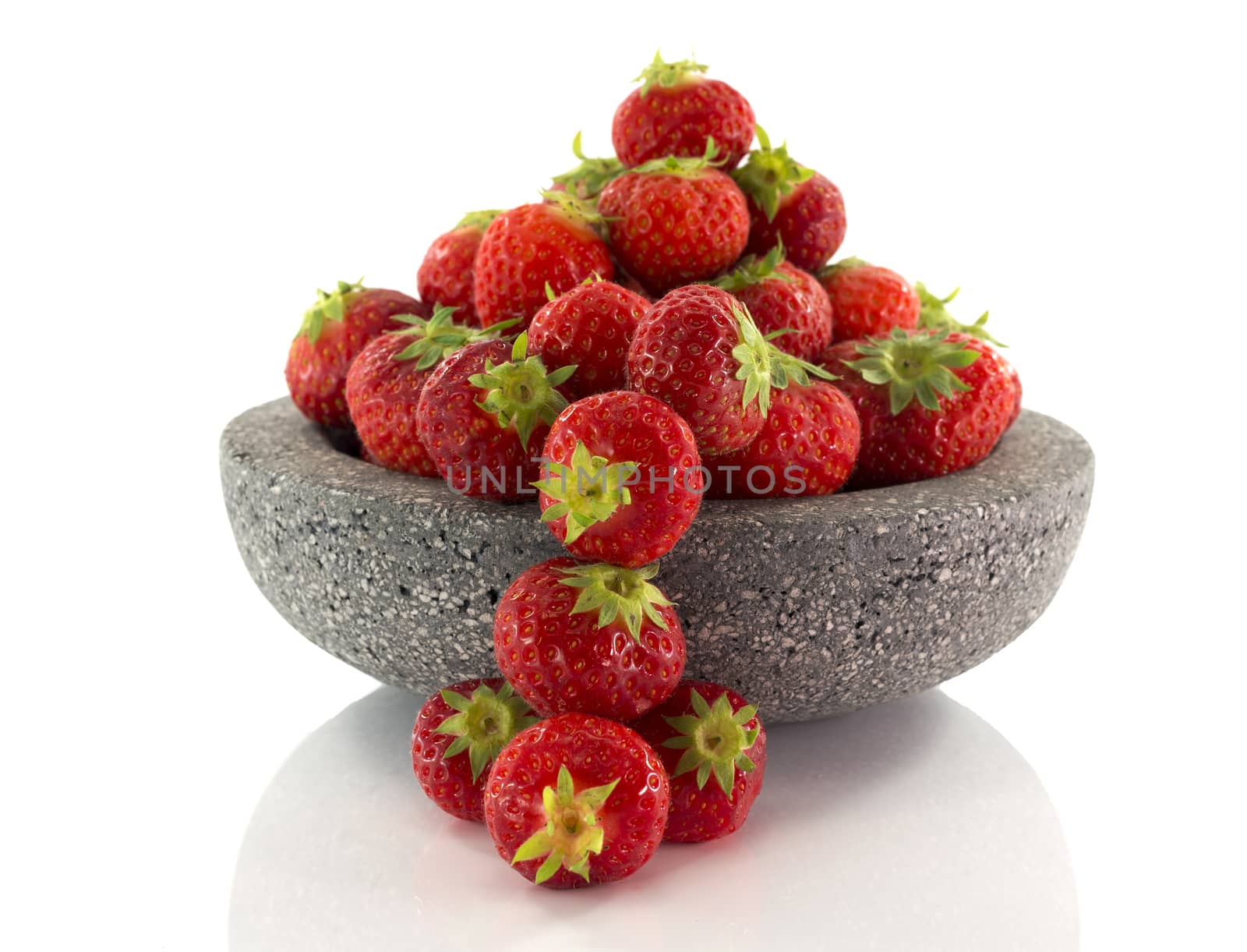 plate with red strawberries isolated on white