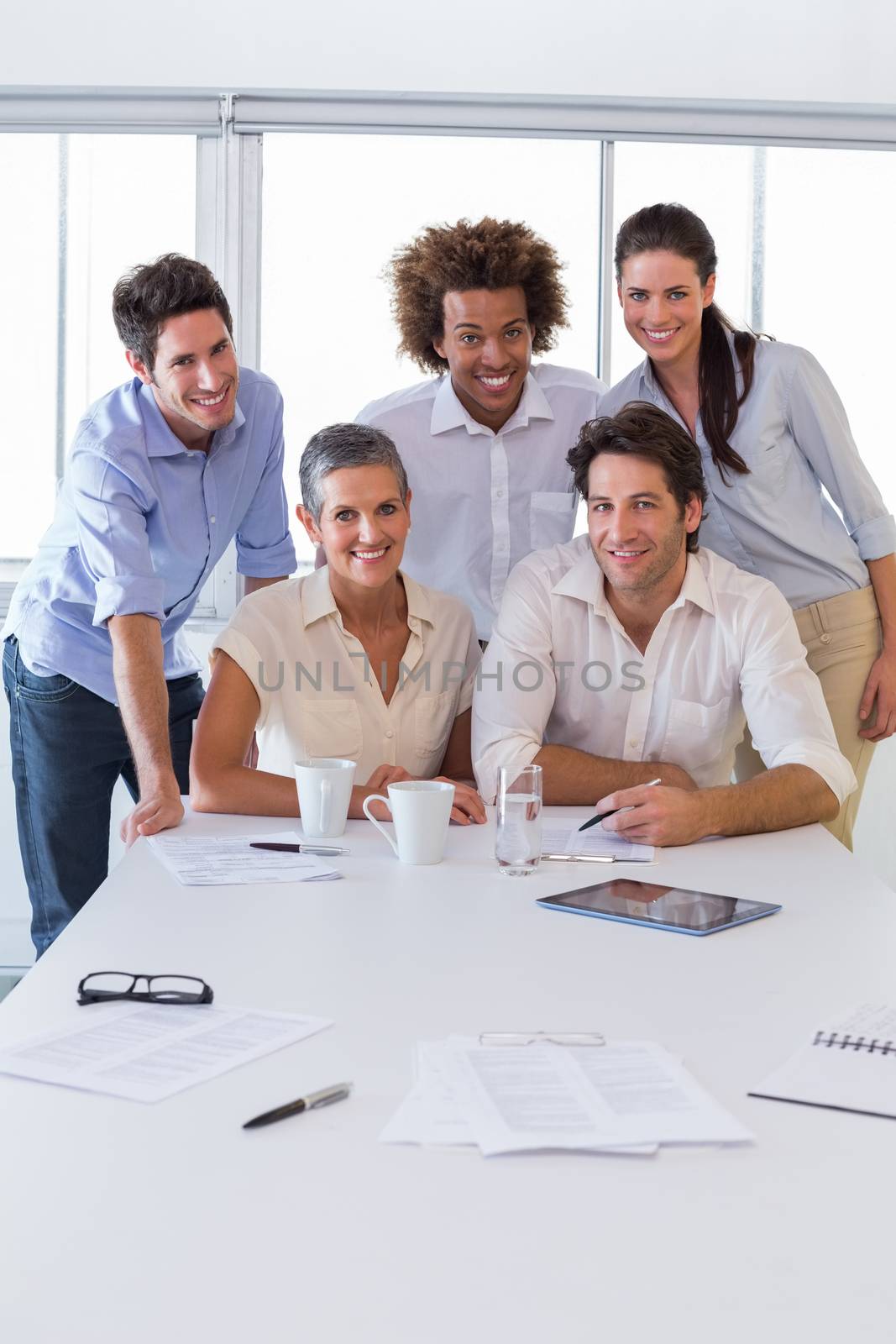 Attractive business people smiling in the workplace by Wavebreakmedia