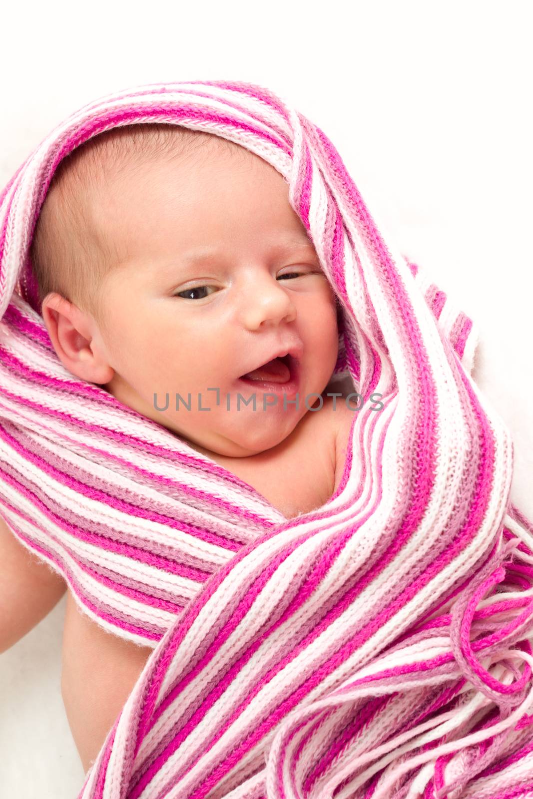 smiling newborn baby - the first week of the new life