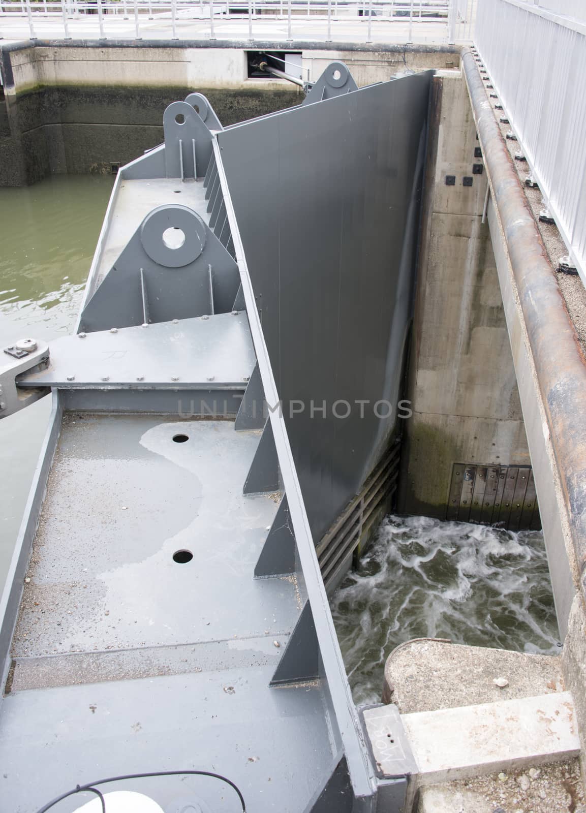 water coming out of the river sluice door