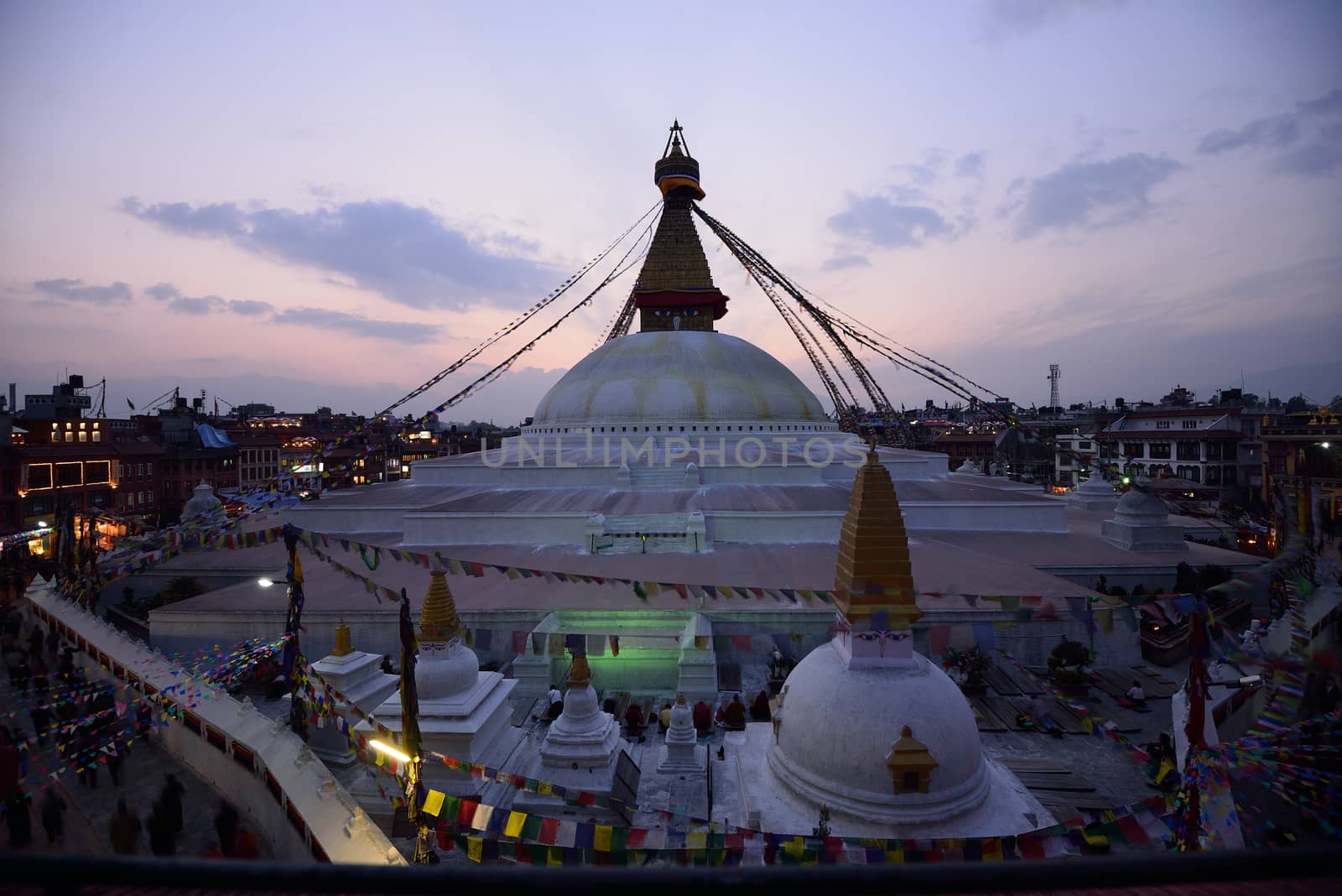 Boudhanath (Boudnath) Stupa at sunset. Kathmandu, Nepal by think4photop